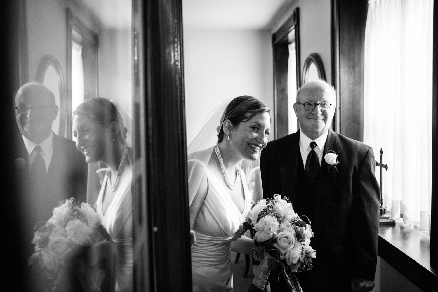 a bride and her father before the ceremony