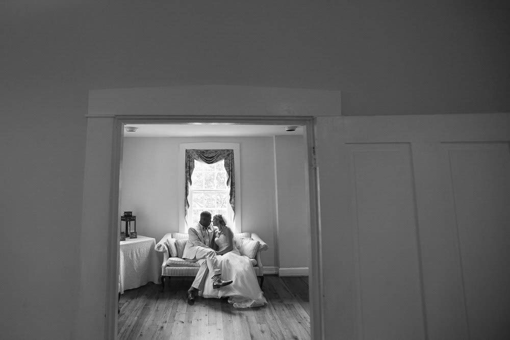 a couple on a couch, a relazed candid style portrait