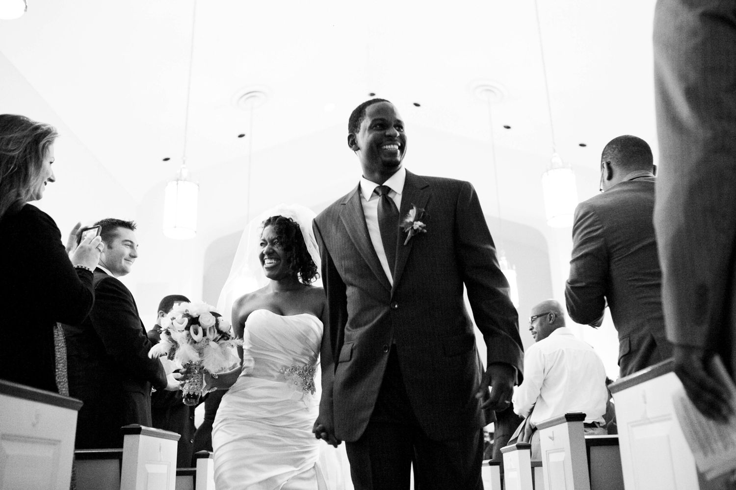 a couple exiting a ceremony