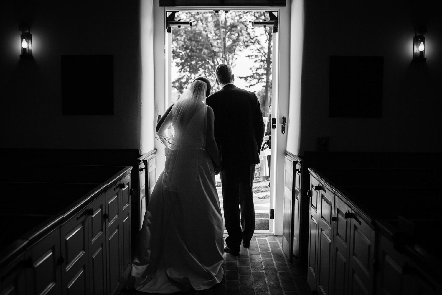 a wedding couple face out a church door, Peace Church