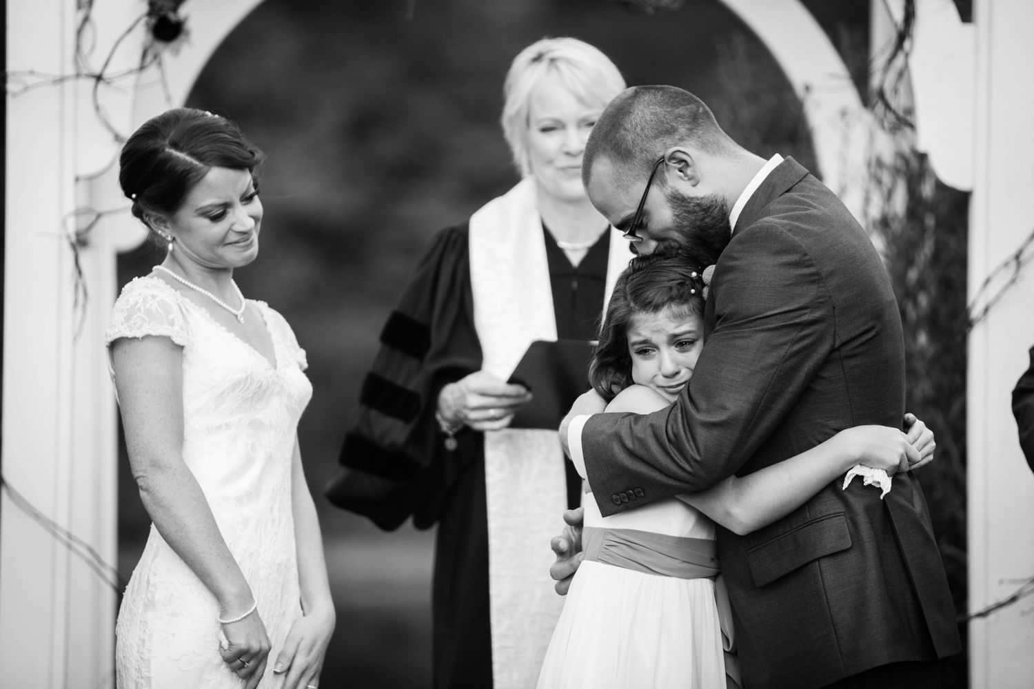 groom hugging his daughter