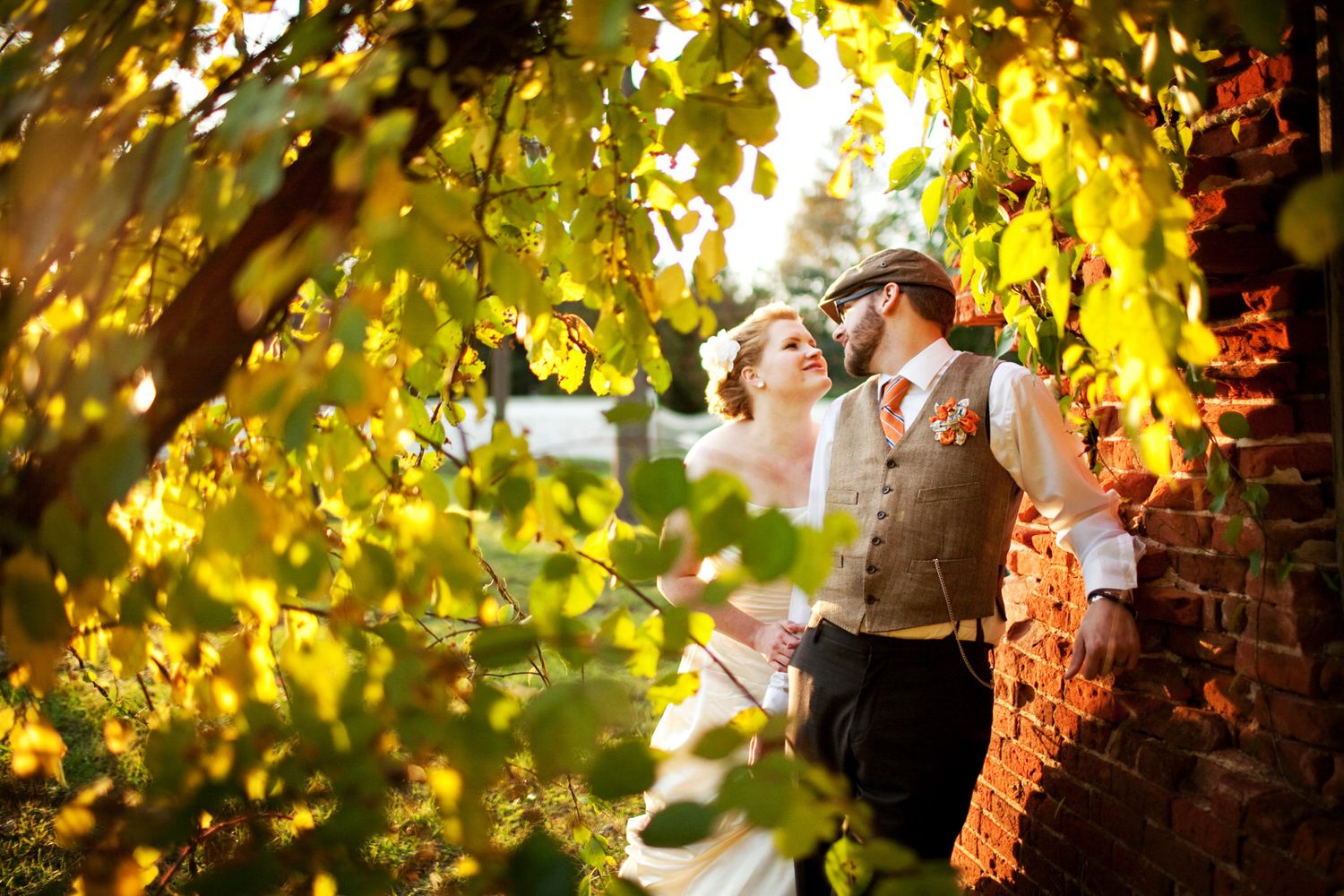 cool couple, groom has a fun hat