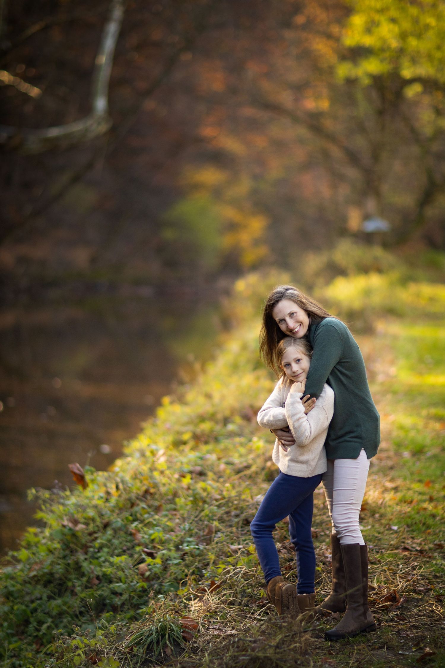 A playful sequence of photos showing two people sharing joyful moments in an autumn forest setting.