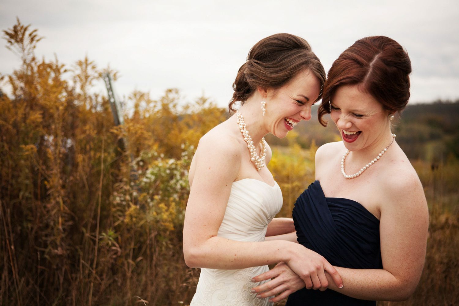bride and lady laughin