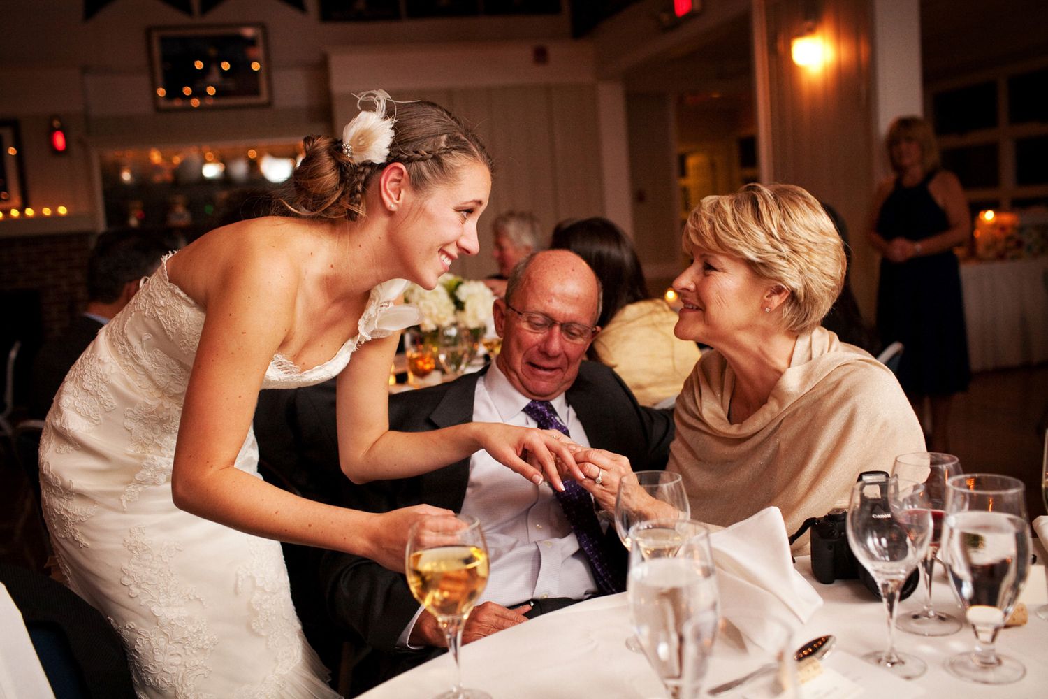 showing off a ring to family members