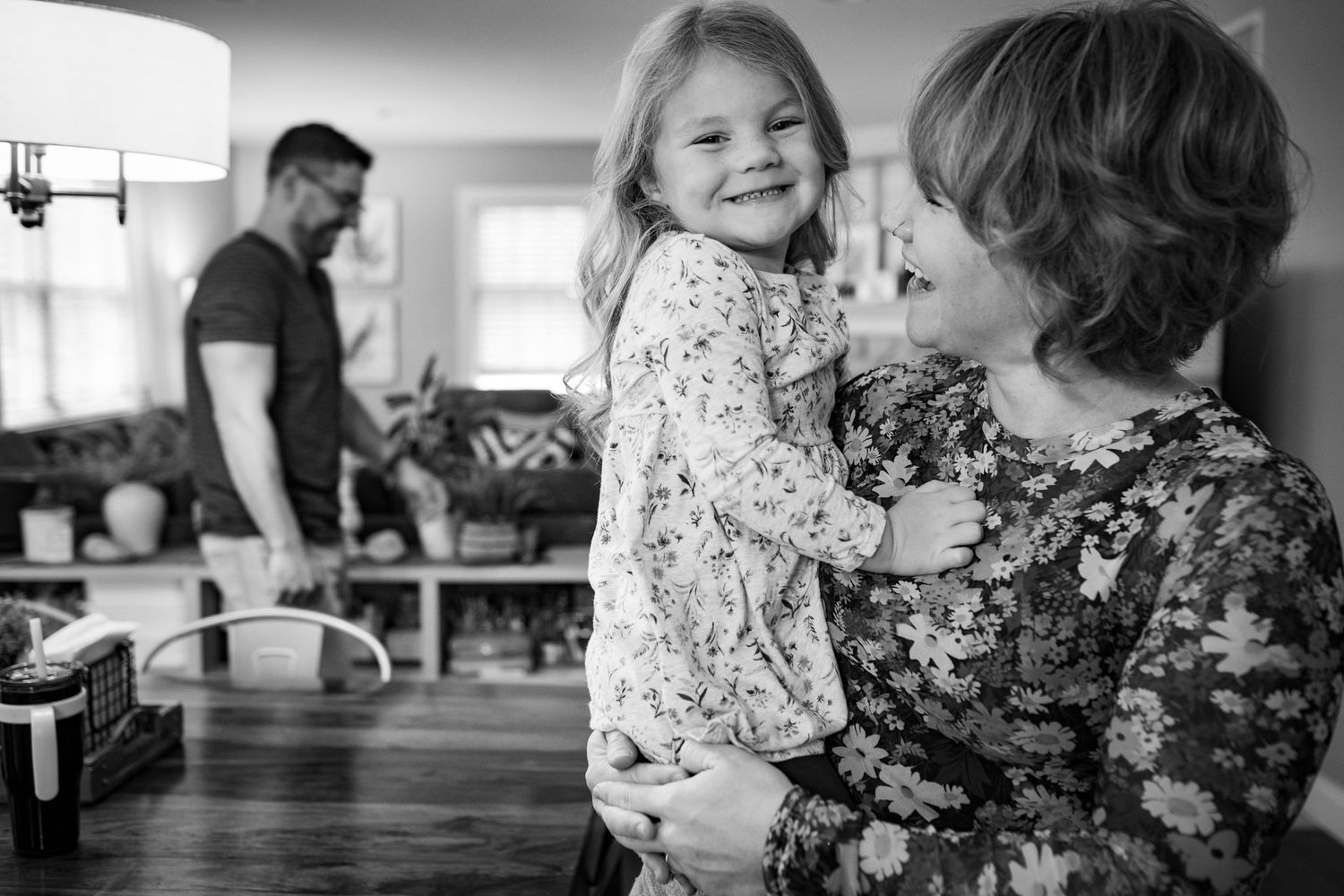 A series of candid moments showing family time and play in a bright indoor setting.