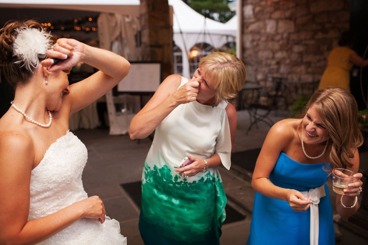 bride smelling her armpit