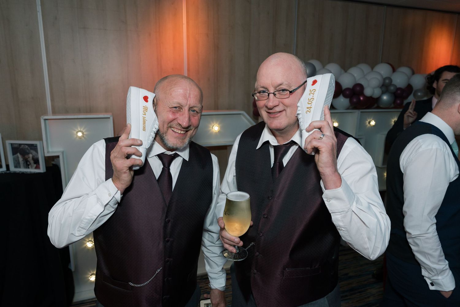 A series of six candid wedding party photos showing people laughing and dancing at a celebration.