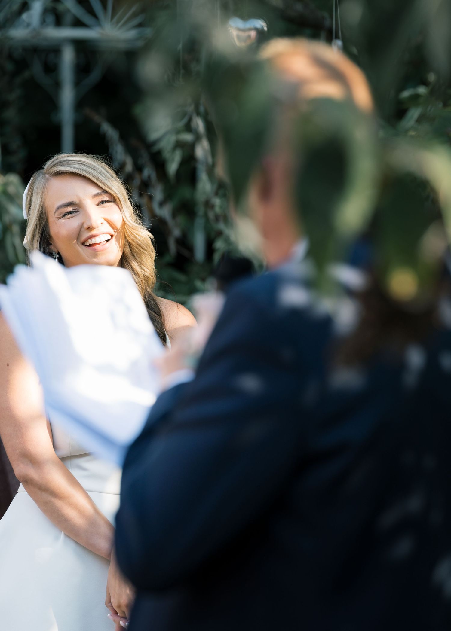Candid moments captured during an outdoor wedding celebration.
