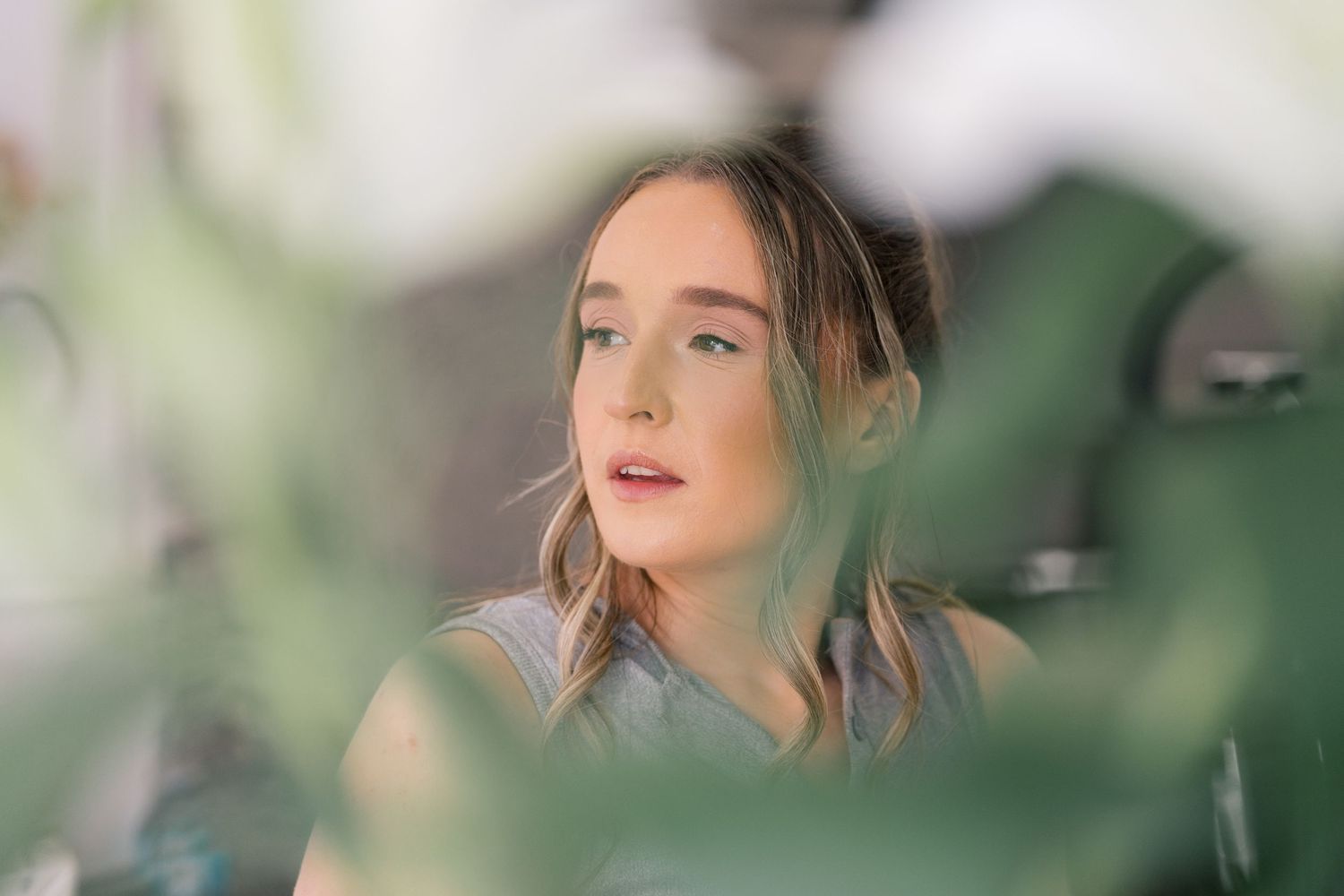 A series of candid getting ready shots showing a pink-clad figure in natural lighting.