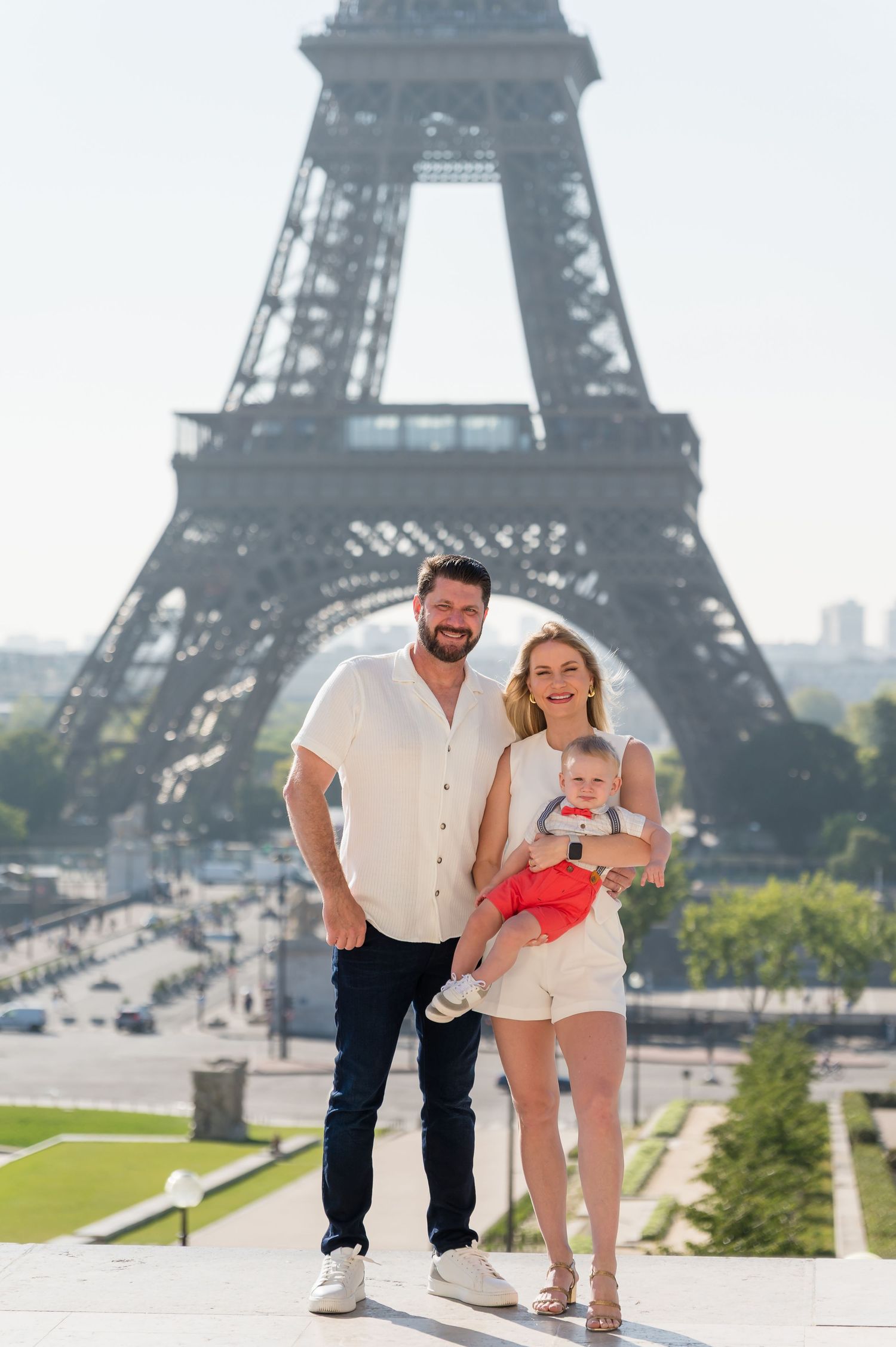 Group enjoying a sunny day at Trocadero square with the iconic Eiffel Tower in background, Paris France.