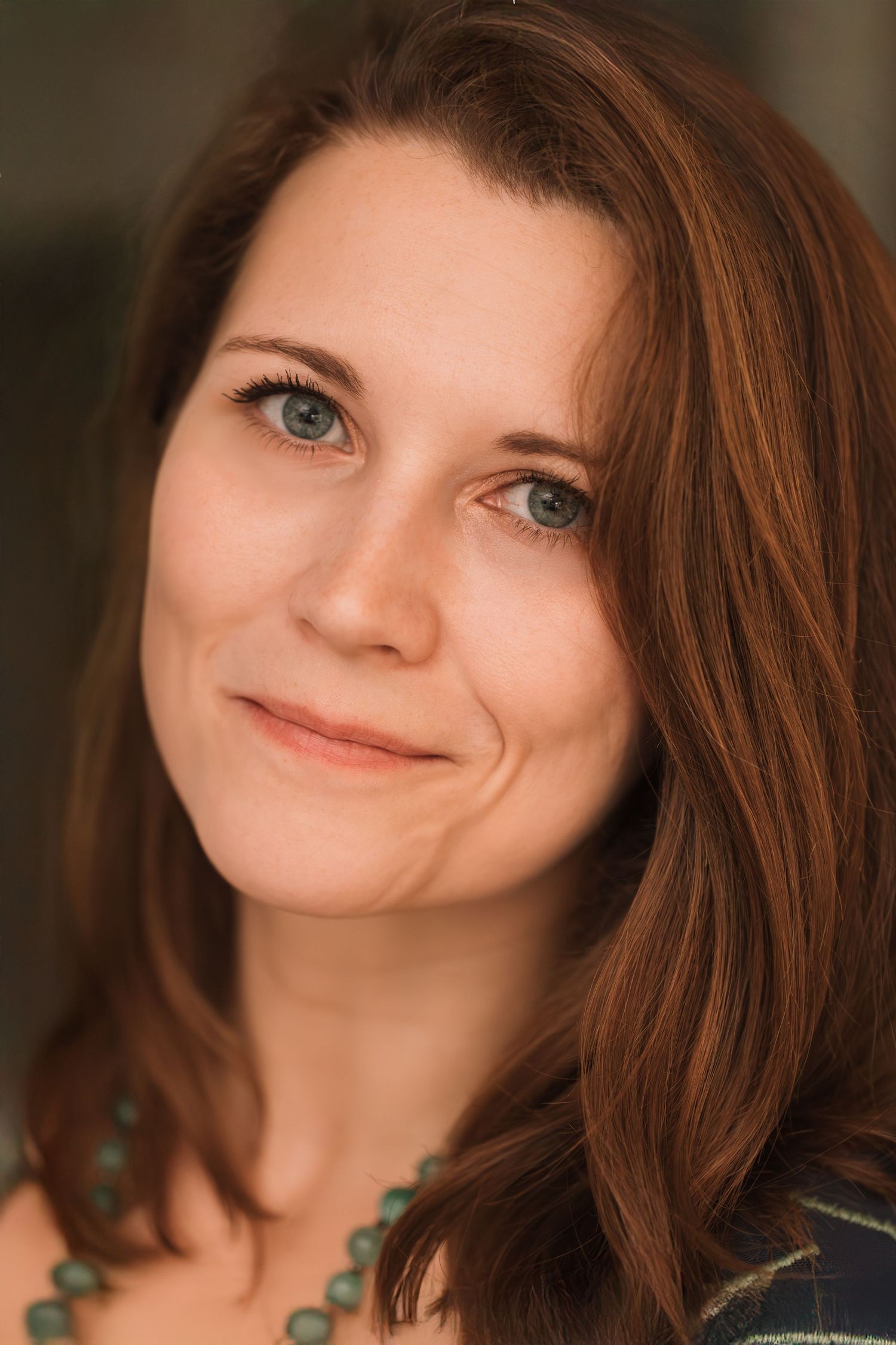 A series of expressive portrait shots showing warm smiles and playful expressions against a blurred background.