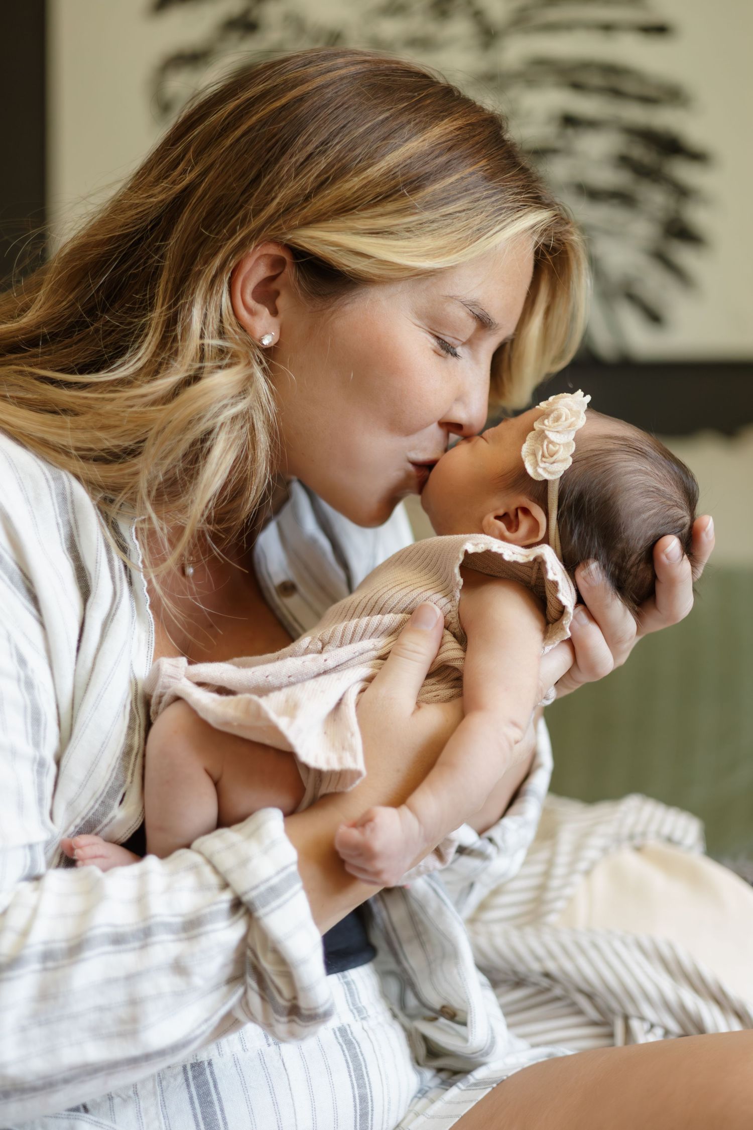 Intimate lifestyle photography showing gentle moments in natural light.