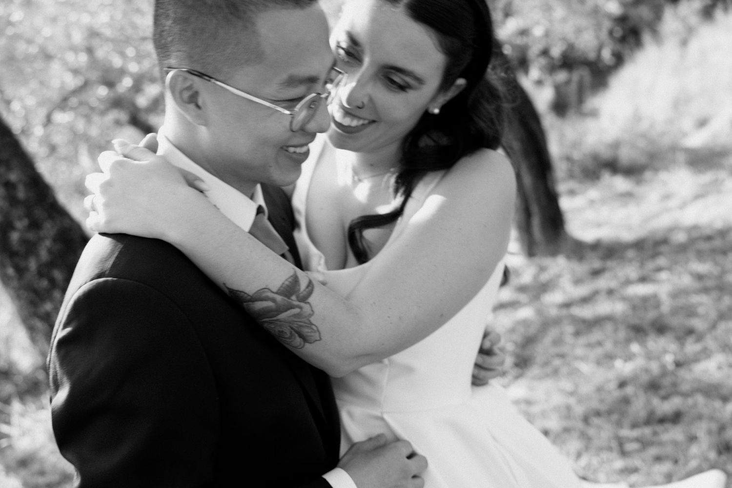 Black and white wedding photography montage showing romantic moments between newlyweds during outdoor photo session.