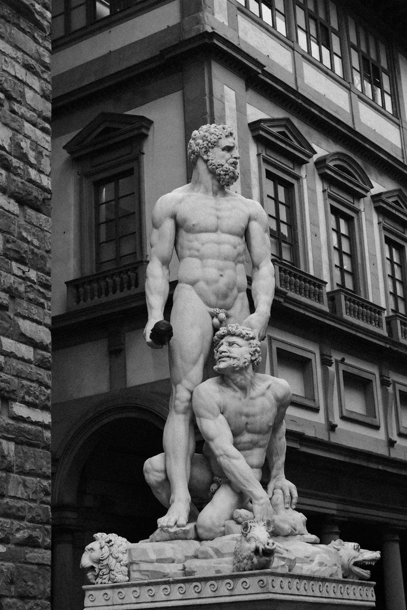Black and white photograph of the Hercules and Cacus statue at Palazzo Vecchio in Florence, Italy.