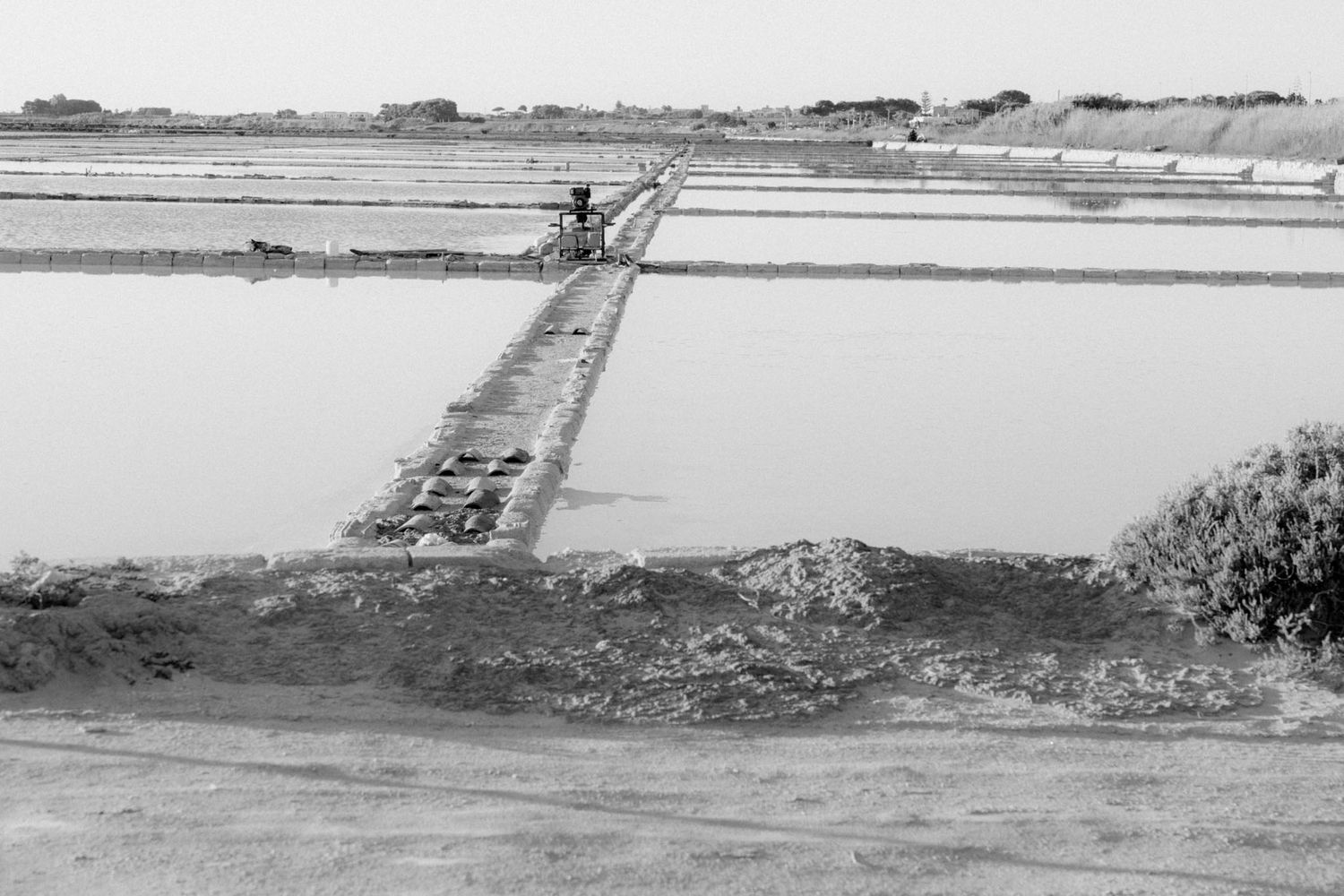 Vintage black and white aerial photograph showing a series of flooded agricultural fields and farmland.