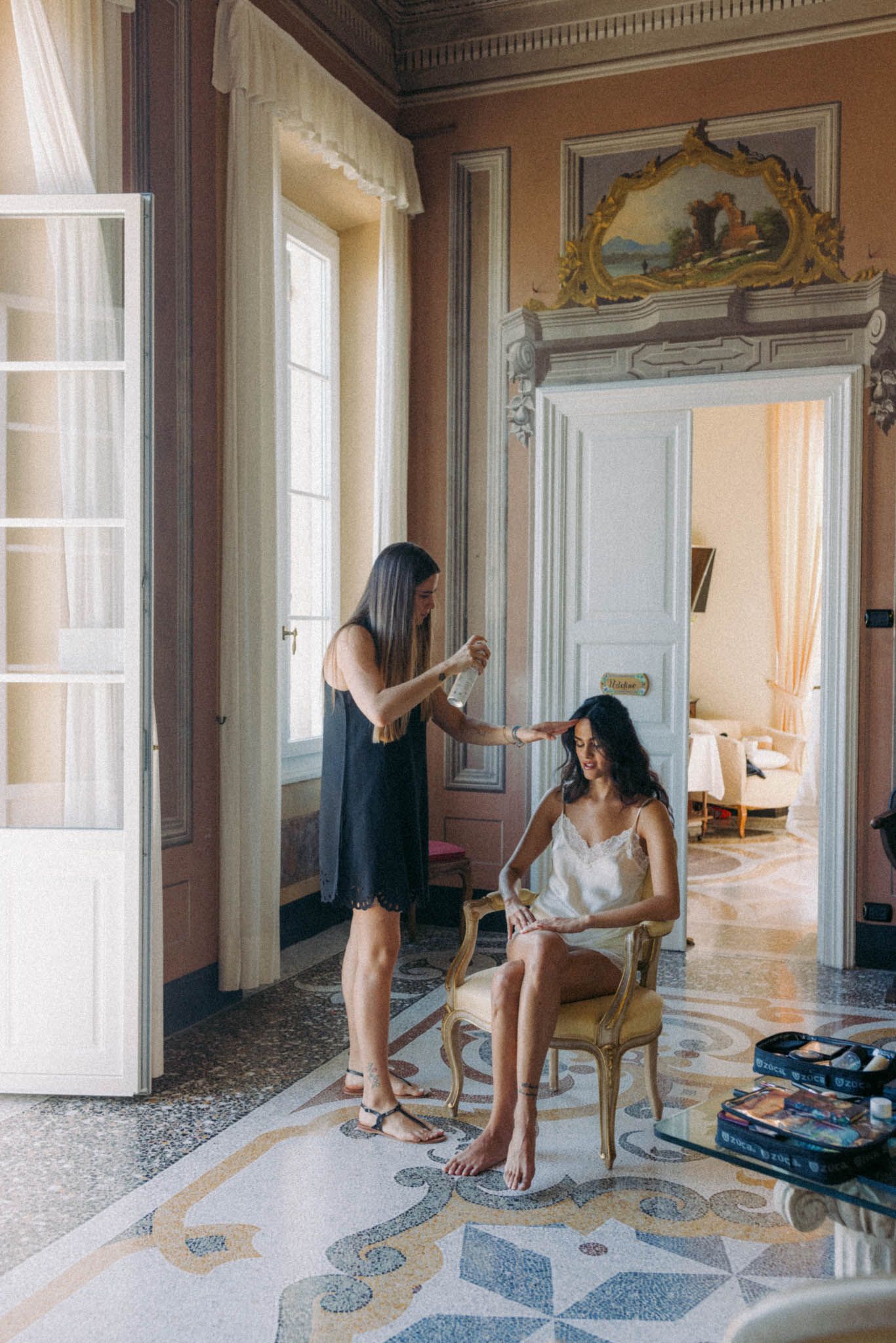 A sequence of photos showing a person in swimwear posing in an elegant room with ornate floors and tall windows.