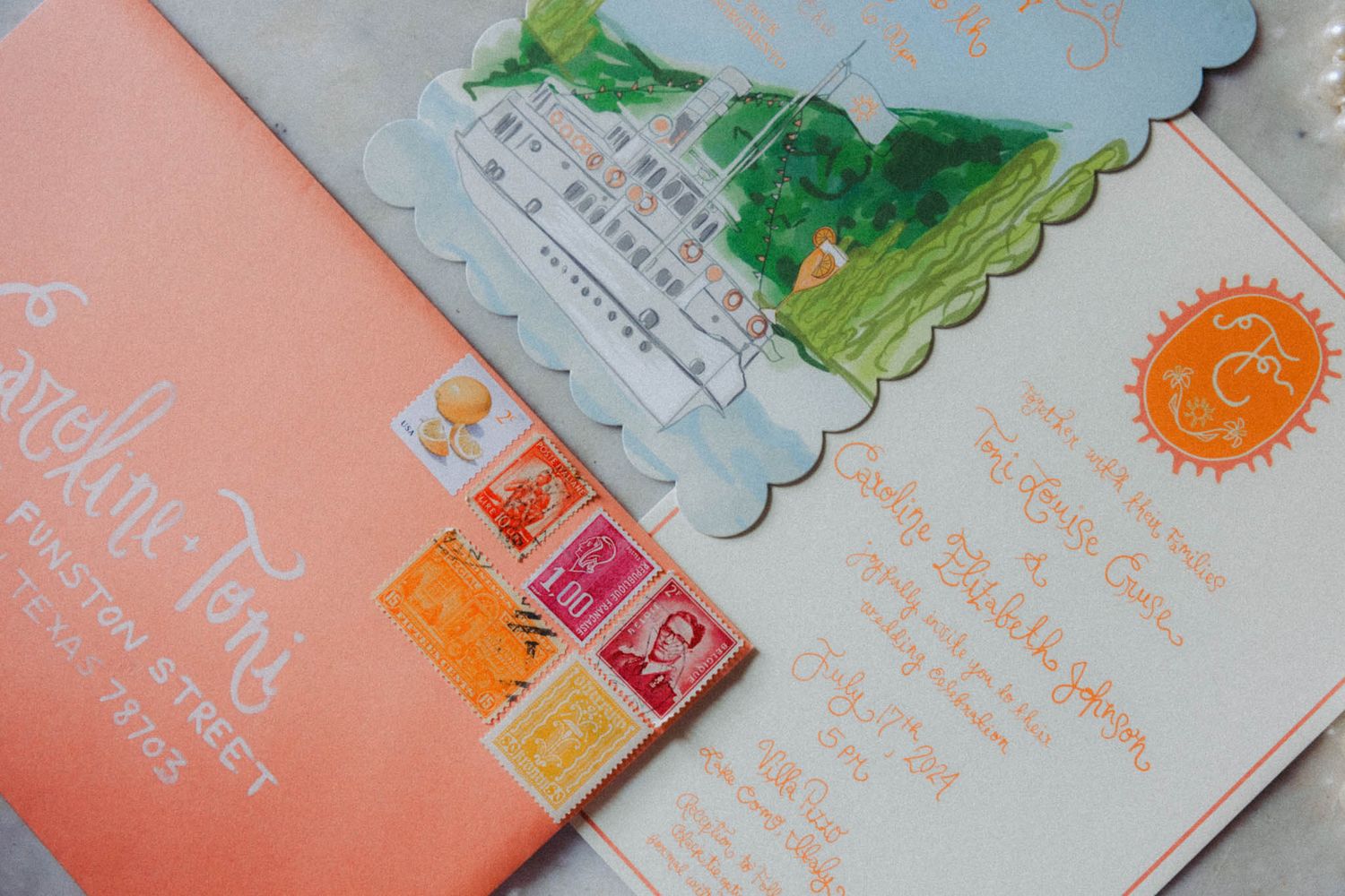 Handwritten text and colorful stamps decorate the corners of delicate paper cards in a soft peach color palette.