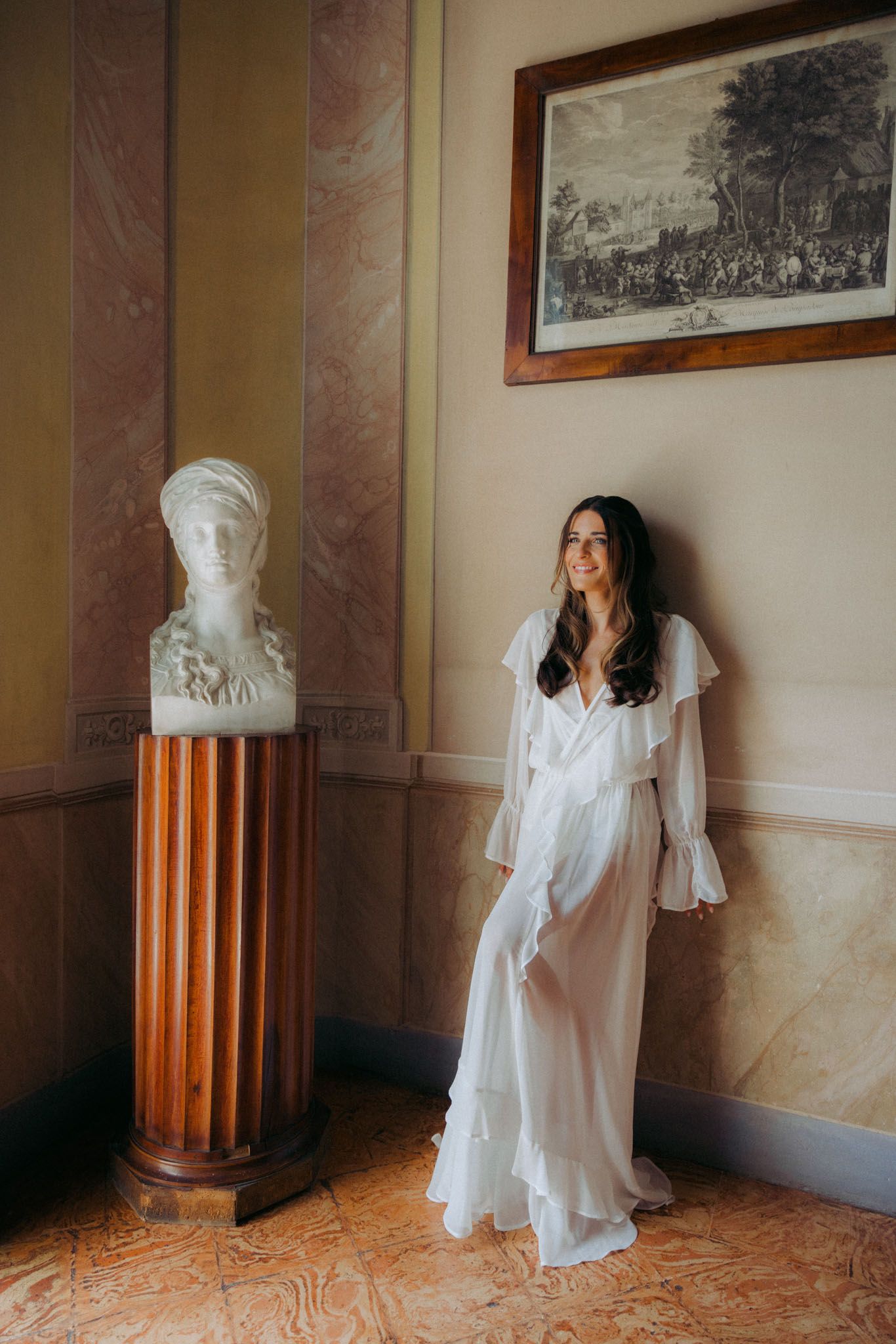 A sequence of five artistic photographs showing a figure in a white dress moving through a vintage interior space.