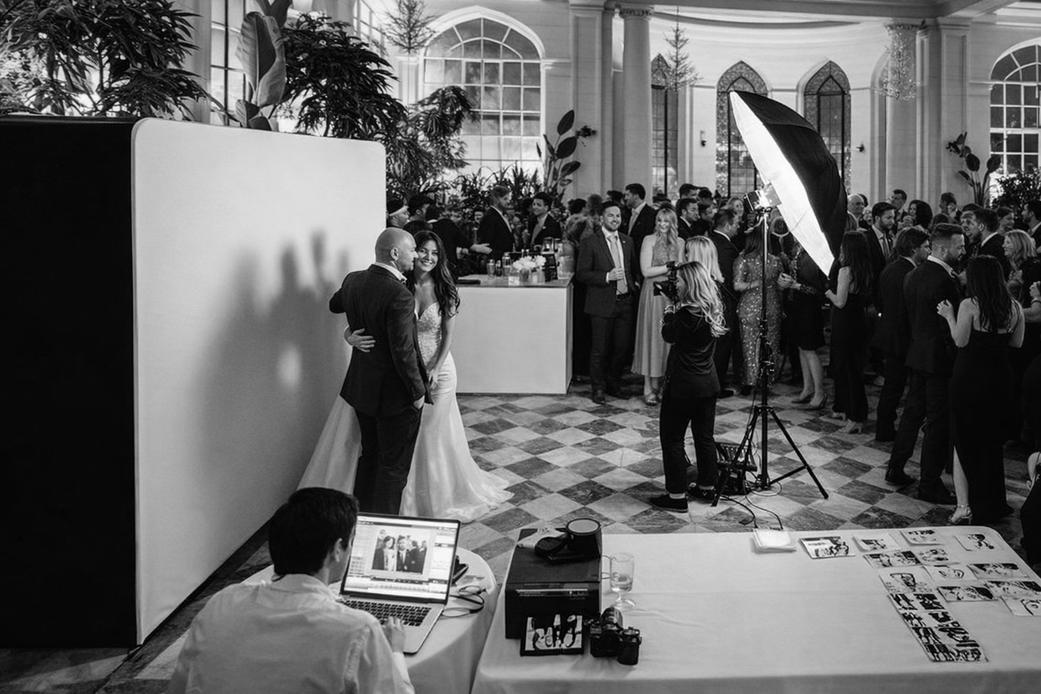 behind the scenes wedding guest portrait station