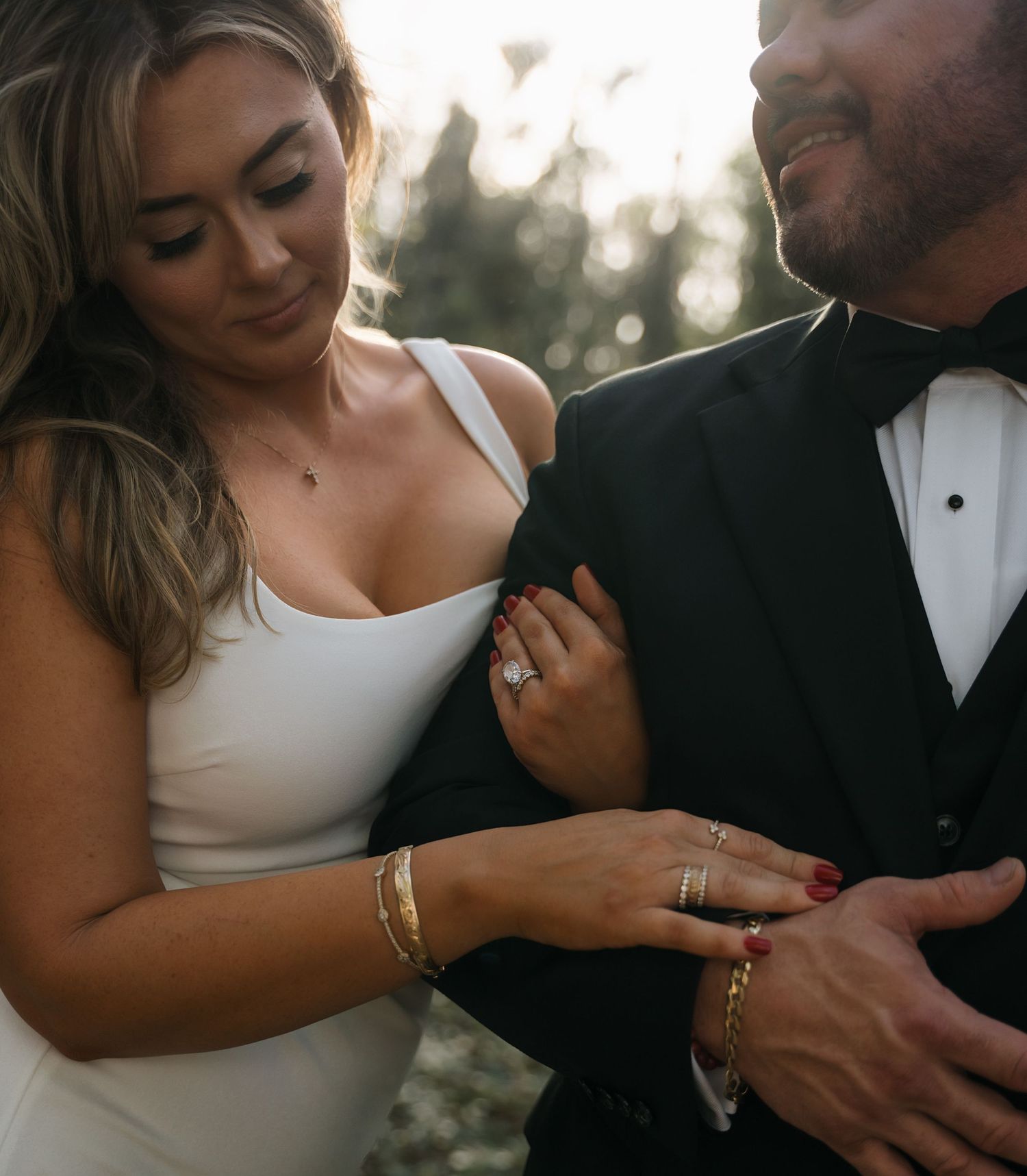 Intimate wedding portrait sequence showing tender moments and natural interactions.