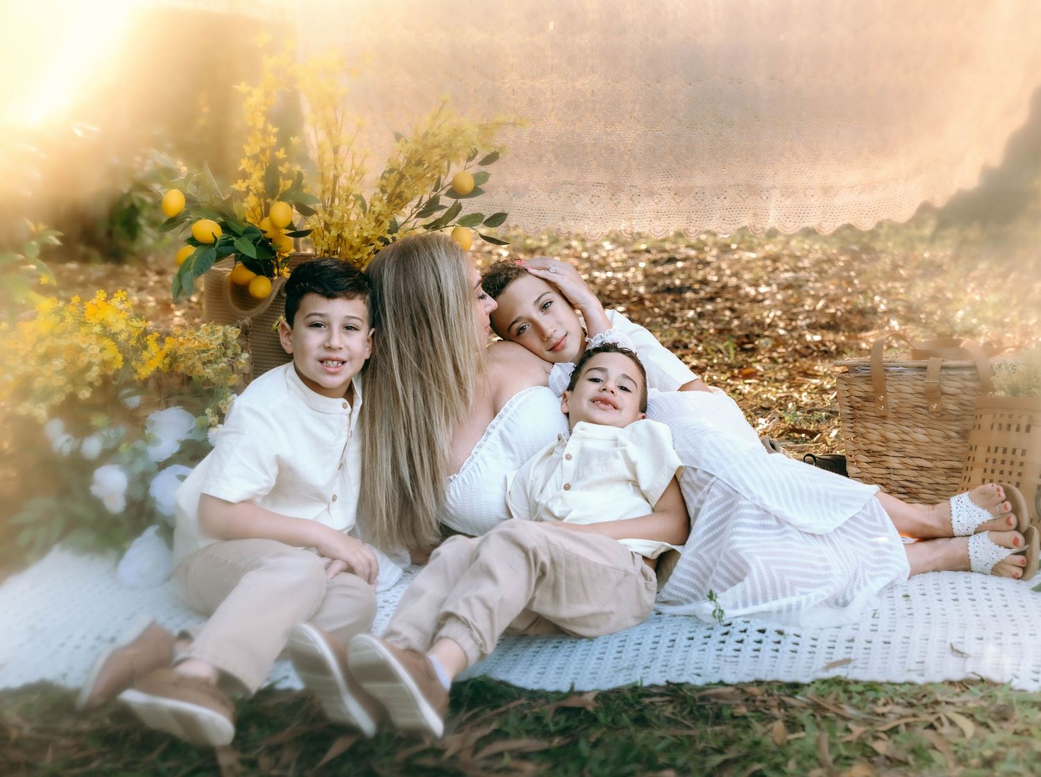 A series of outdoor family portraits showing tender moments between parents and children in soft natural lighting.