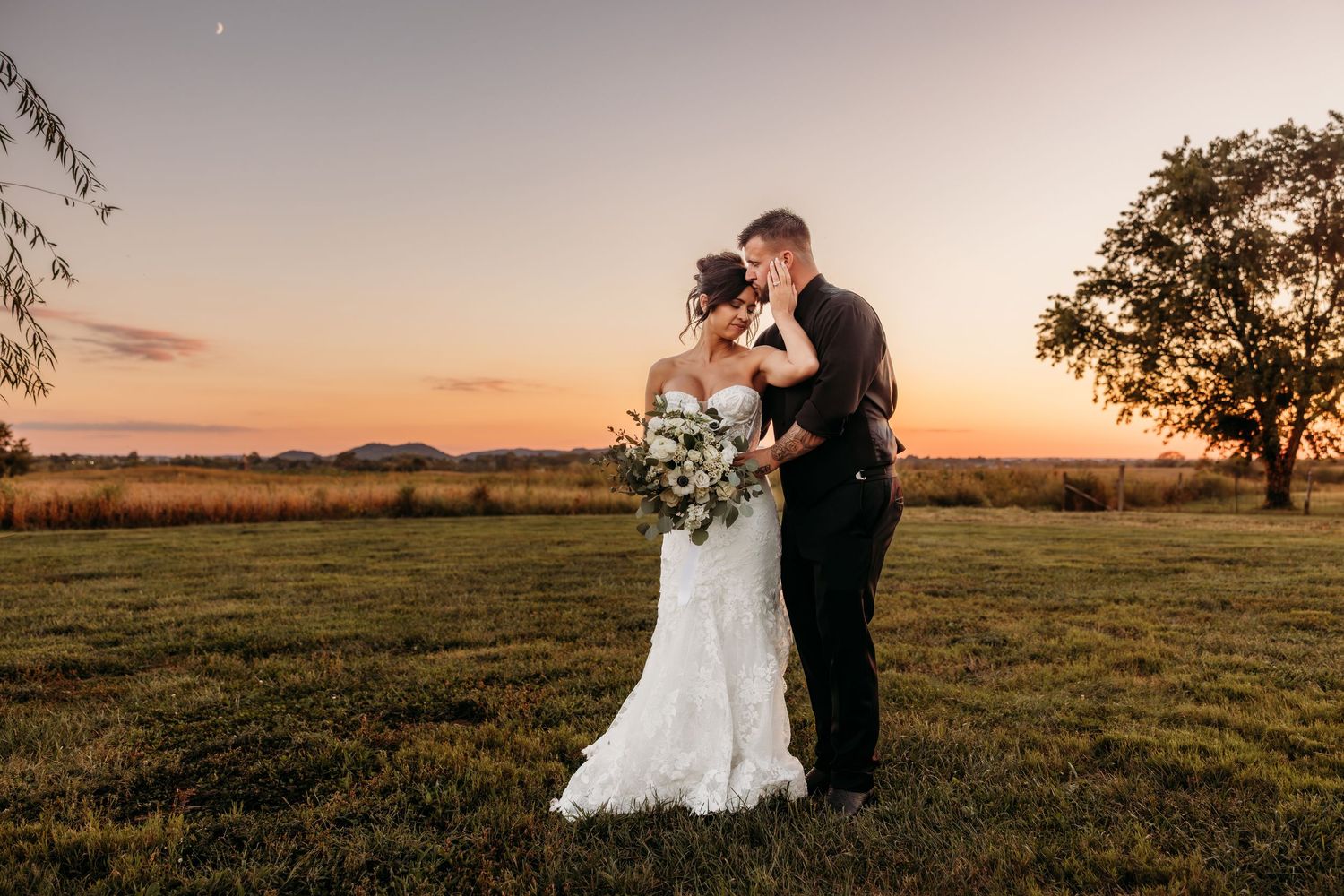 Bride and Groom share an intimate moment during sunset photo session at The Marion Barn in Lebanon, KY.