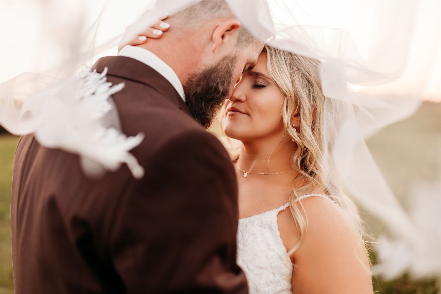 Close-up wedding portraits with soft lighting and intimate emotional moments.