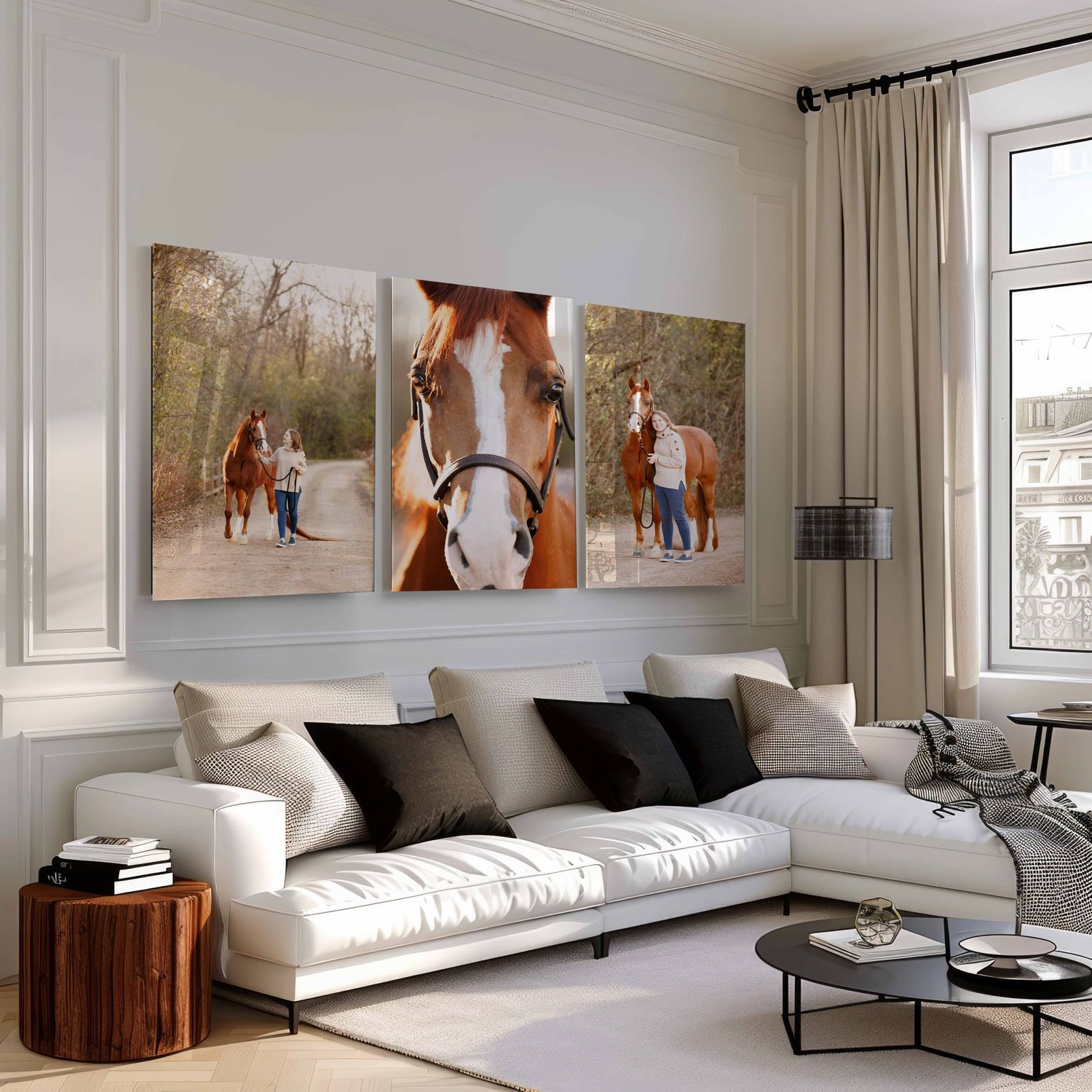 Modern living room with white sofas, horse photography wall art, and wood accents in a bright minimalist space.