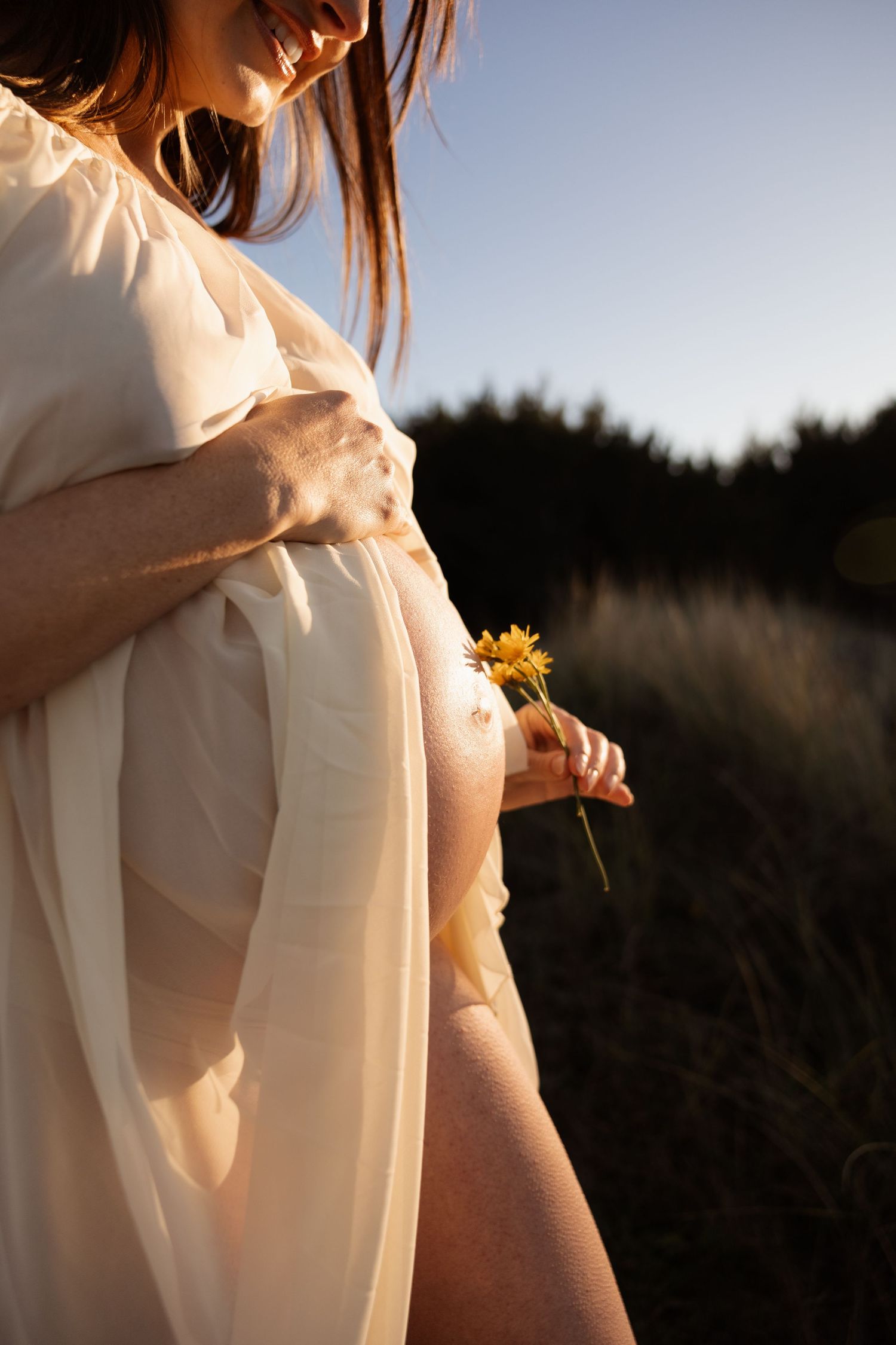 Sunset maternity session at the beach in Christchurch