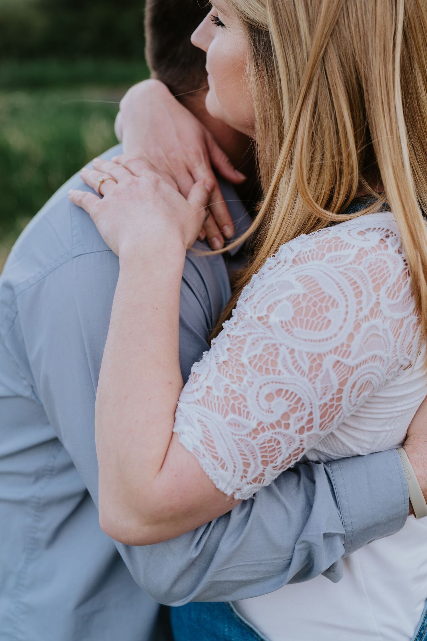 Couple celebrating their engagement during a St. Simons Island proposal photography session, testimony for Lindy Rebro Photography