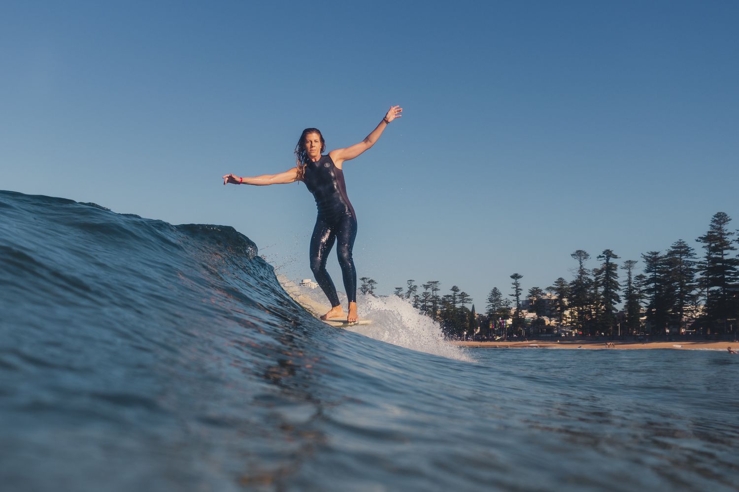 Pro longboard surfer Lindsay Steinriede surfing at Manly Beach — longboard surf photography, Northern Beaches Sydney