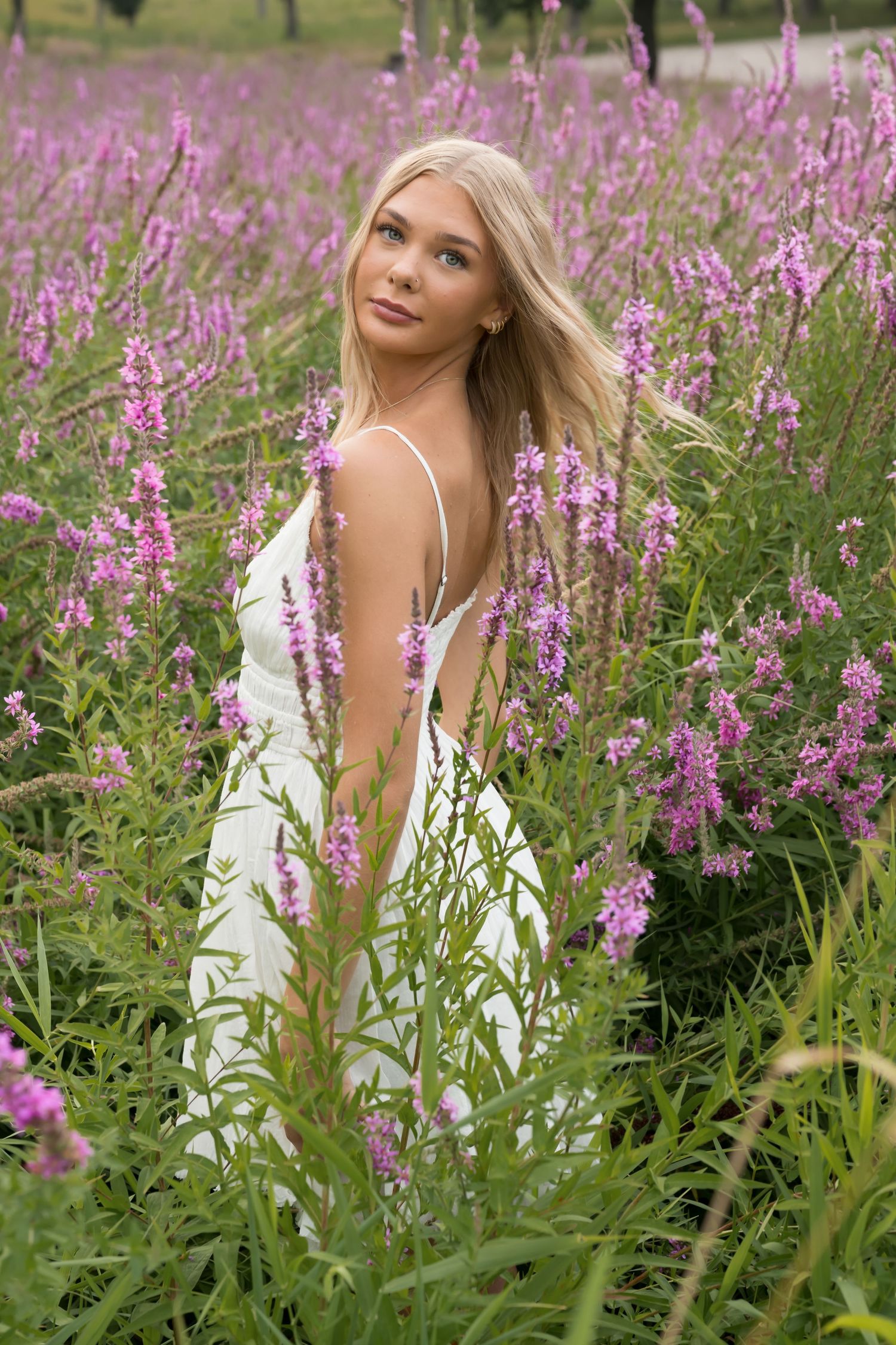 Girl in field of wildflowers.