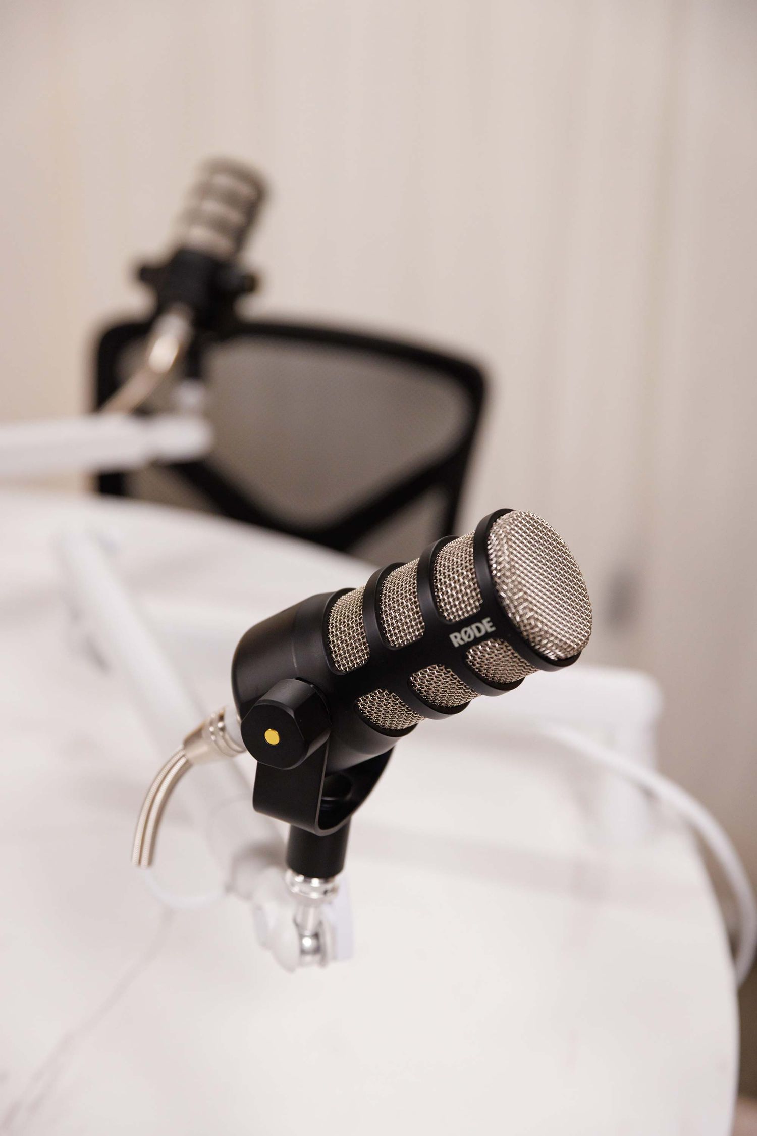 Professional podcast microphone setup at The Pod Life by Lockwood Studios in Seminole FL