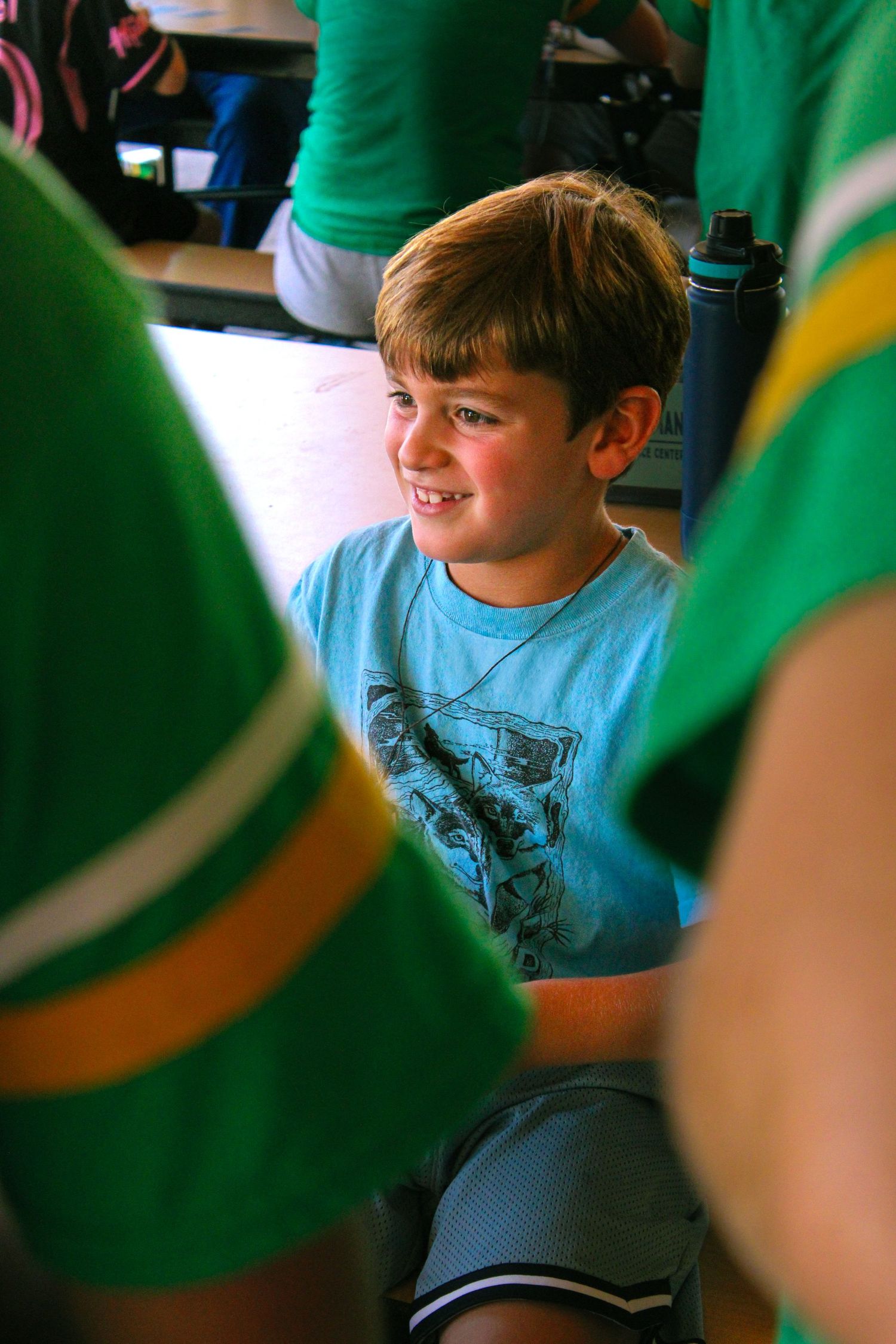 A boy smiling.