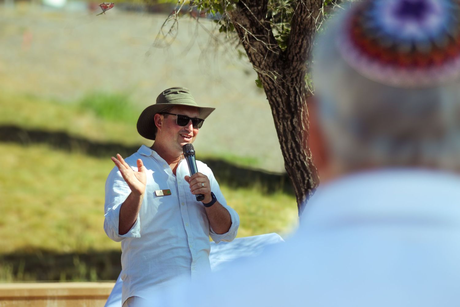 A man talking into a mic.