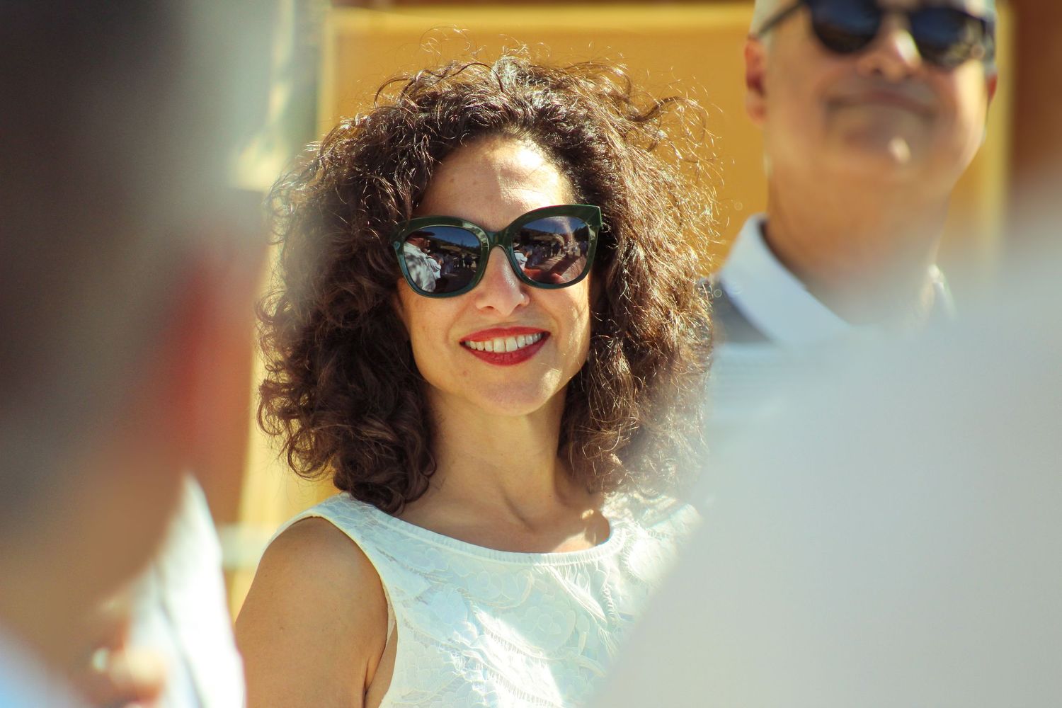 A woman smiling.