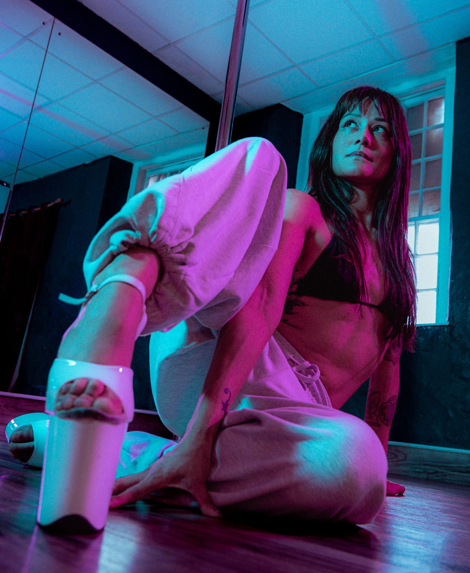 Colourful pole dance photo