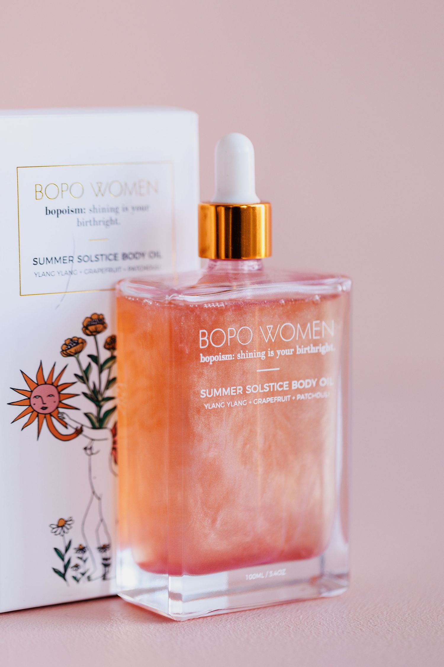 BOPO Women Summer Solstice body oil in pink glass bottle with floral packaging design.