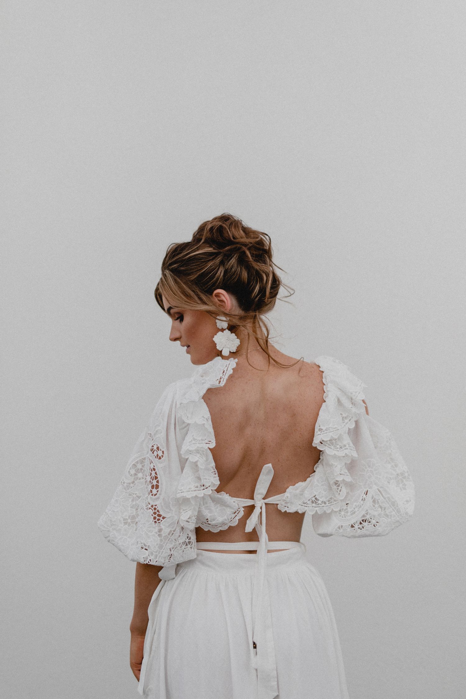 Elegant bridal fashion featuring delicate lace details and romantic styling.
