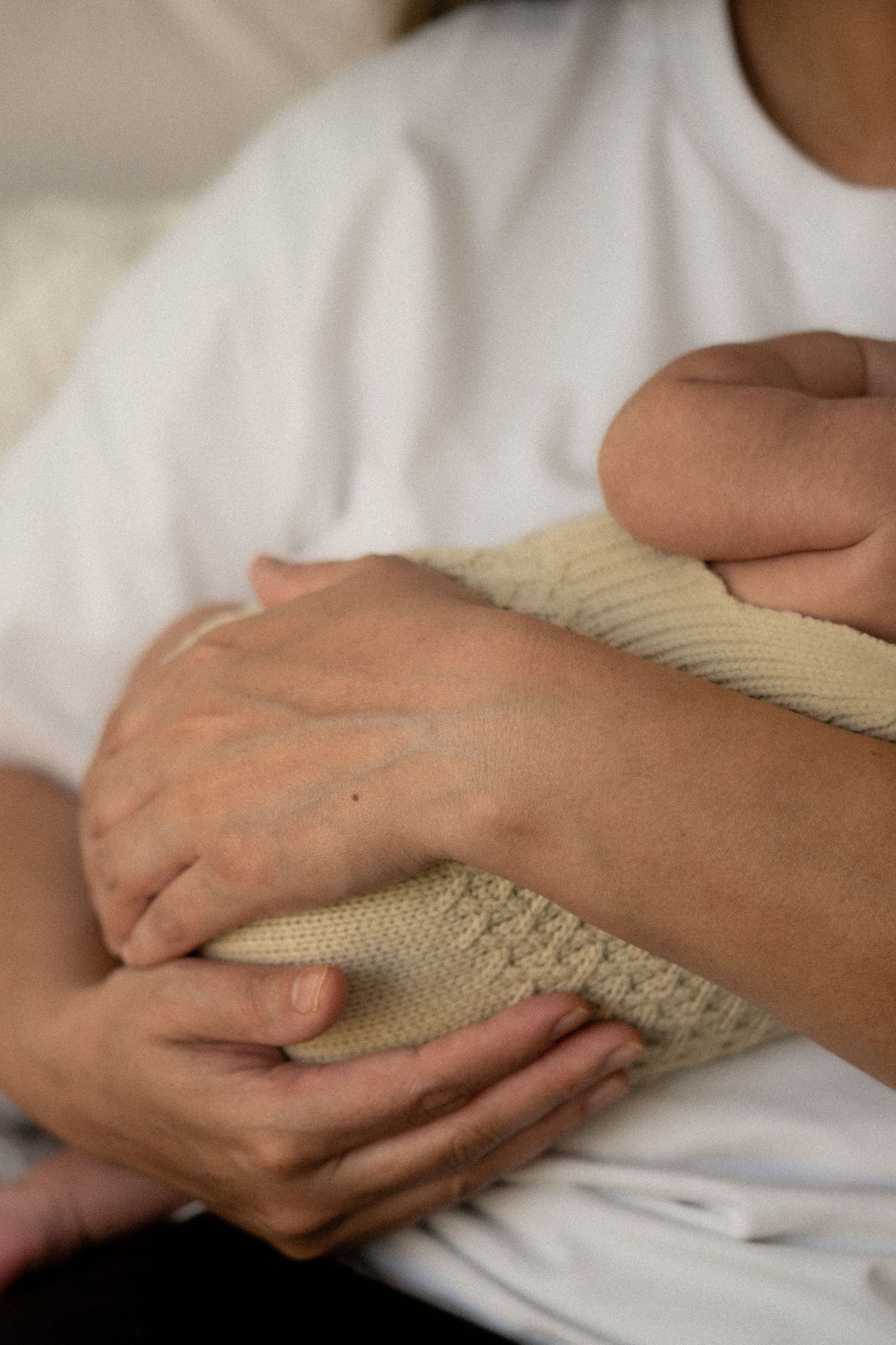Emotional newborn photography capturing the bond between mother and baby in Melbourne.