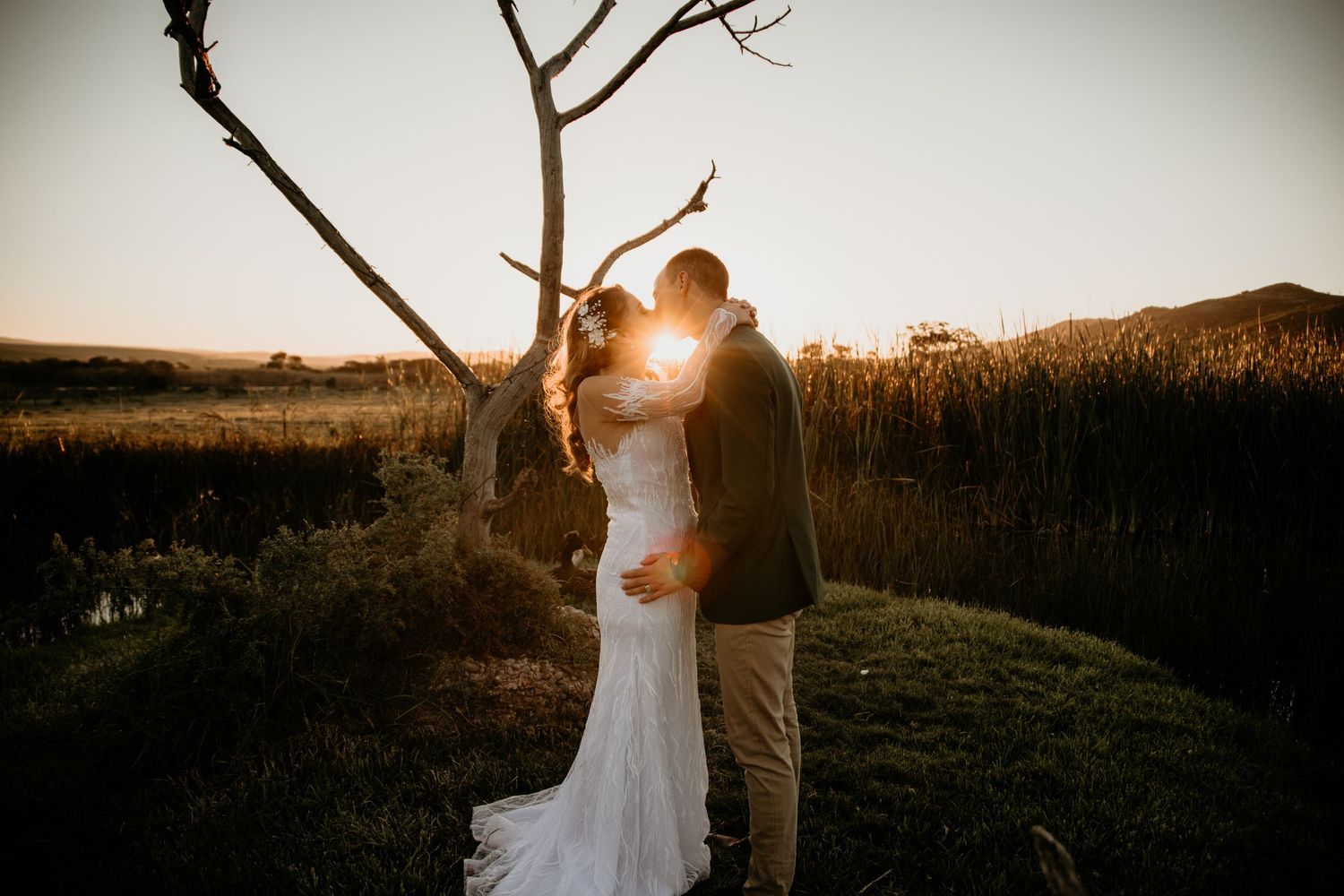 Elegant wedding couple portrait at sunset in George