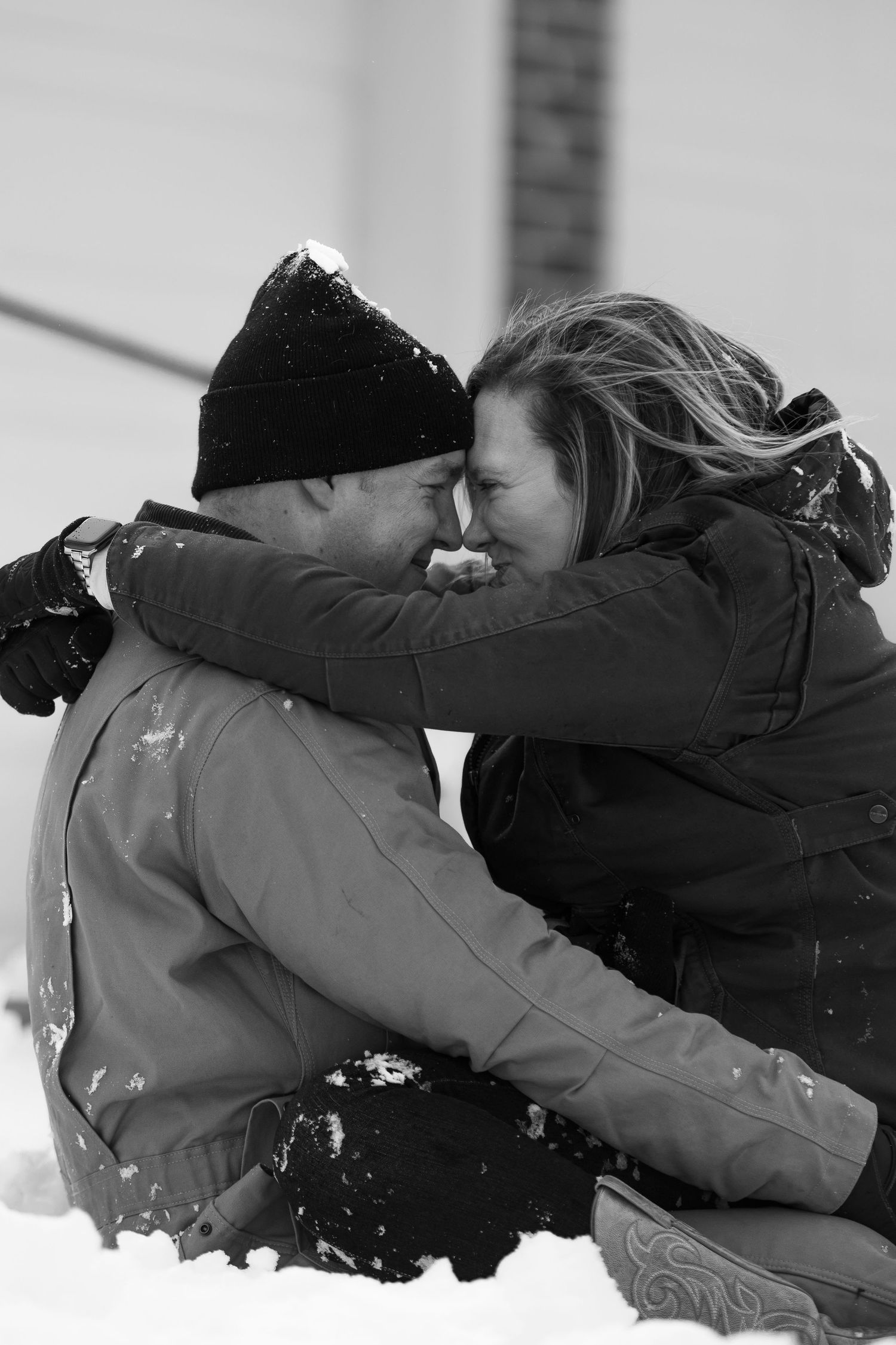 couple playing in snow