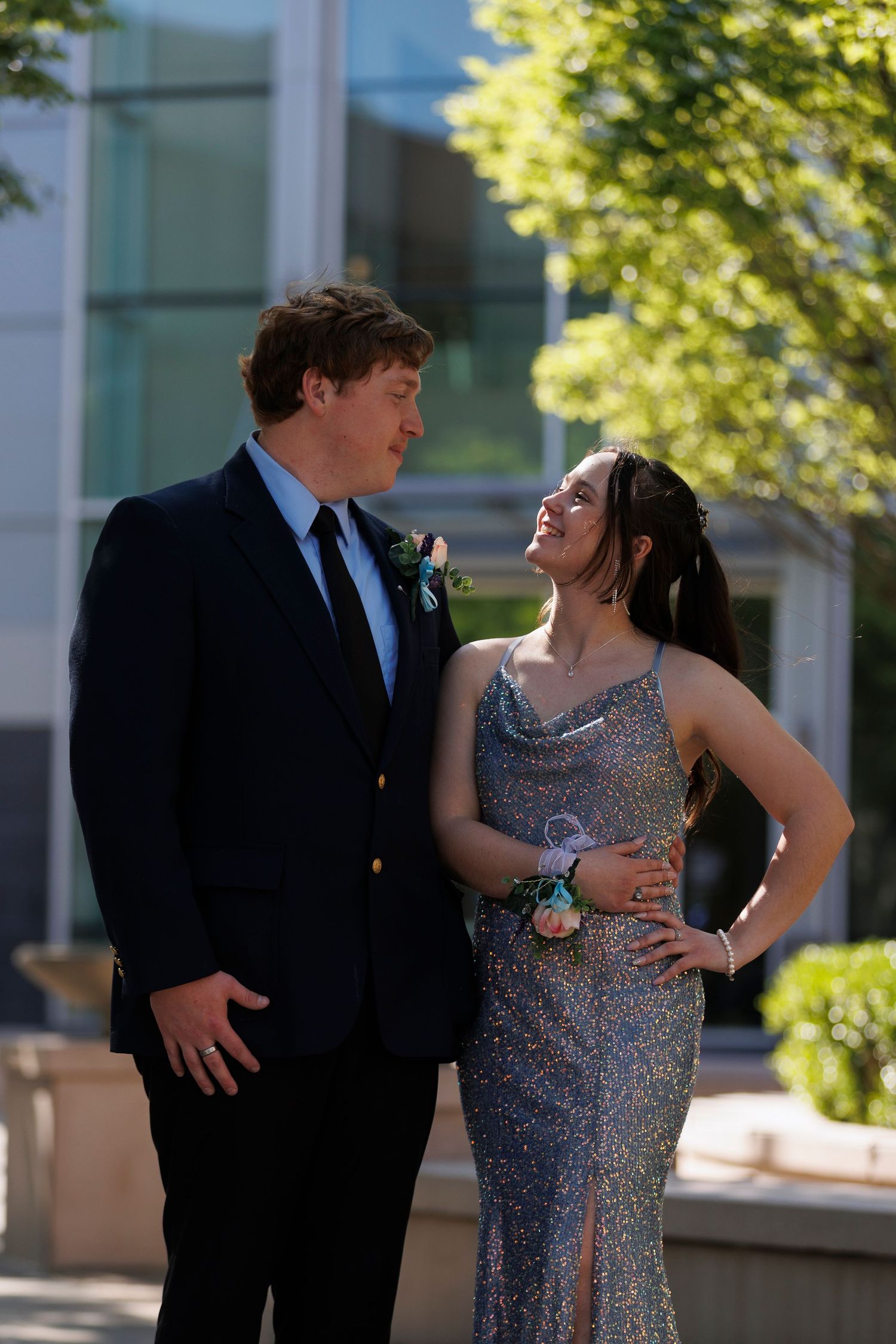 couple dressed for prom, looking at each other