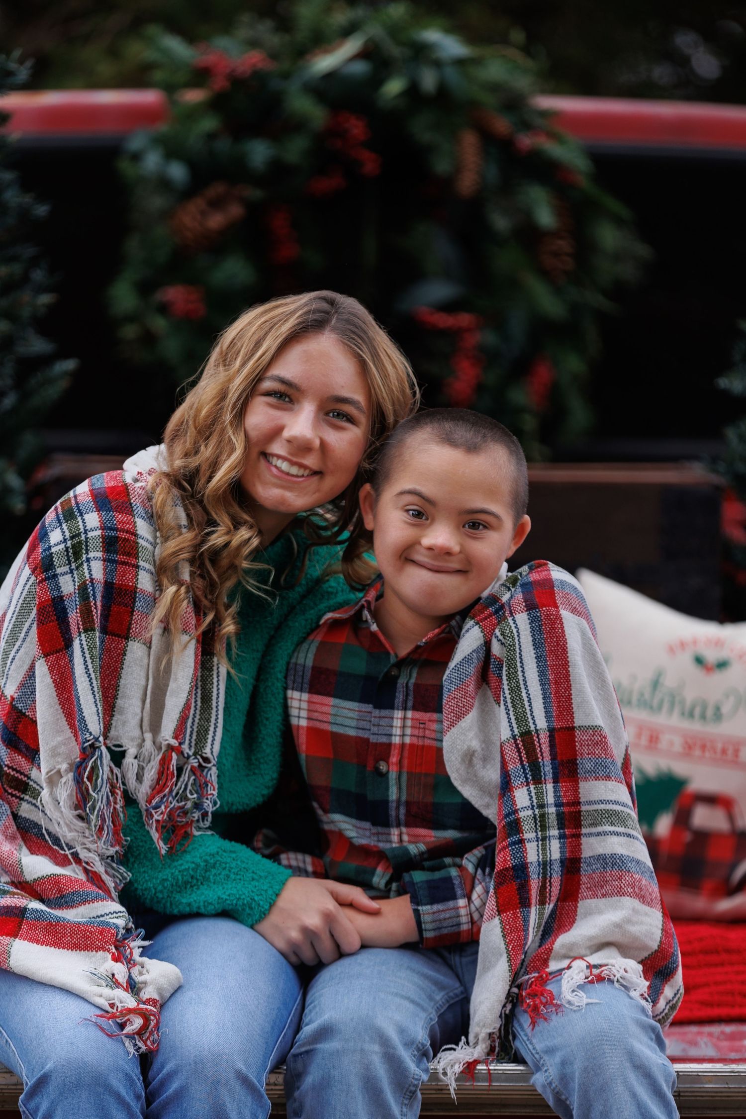 christmas picture of two siblings