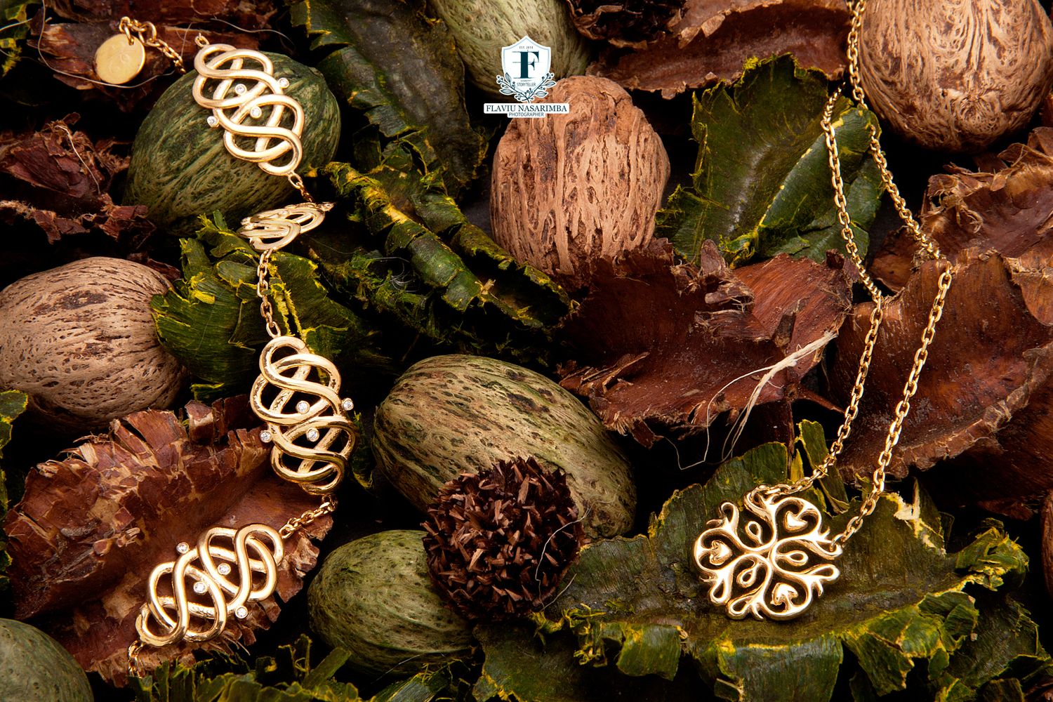 Gold Celtic knot pendant necklace and earrings set on autumn leaves background.