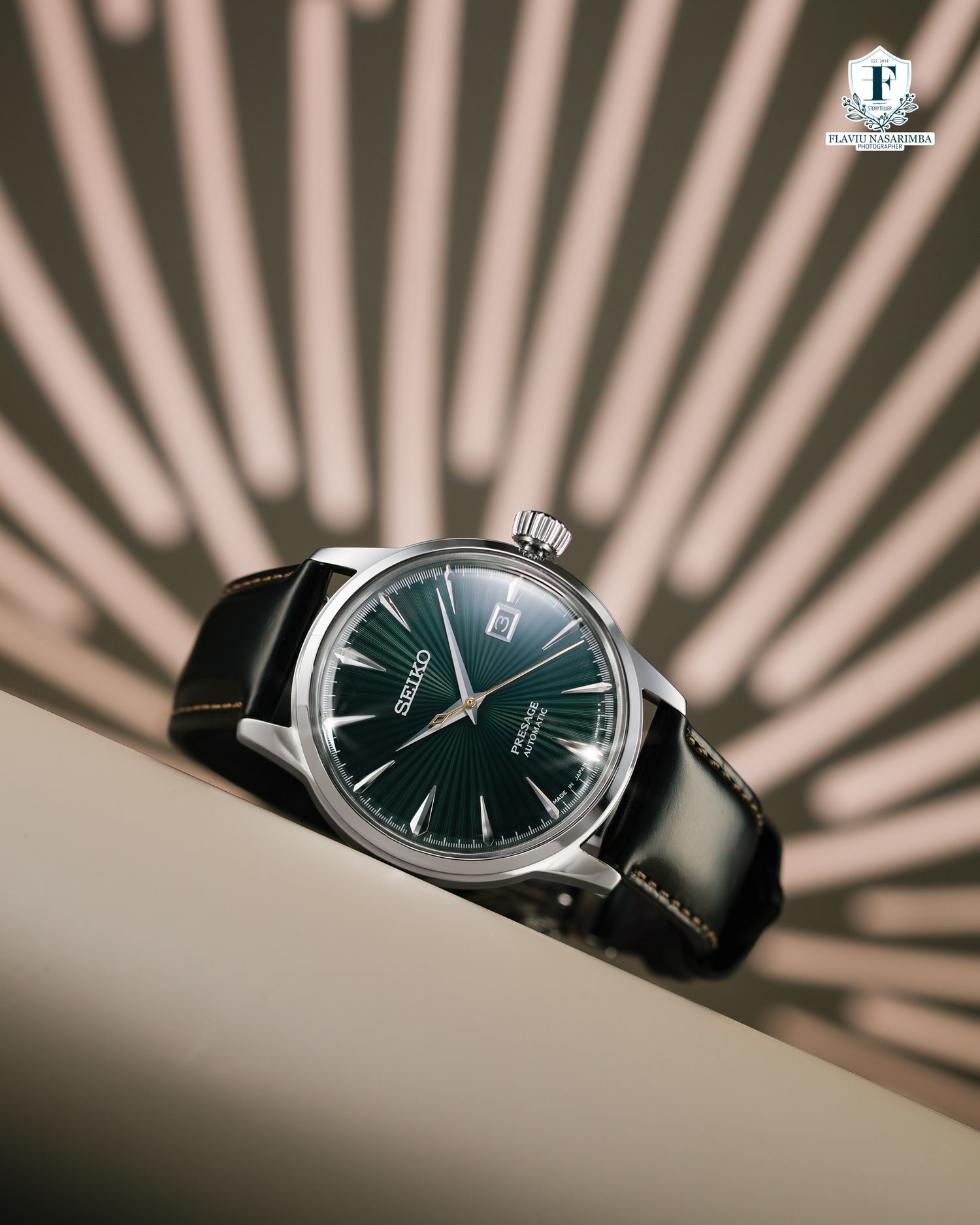 Seiko Presage automatic watch featuring elegant green sunburst dial with black leather strap.