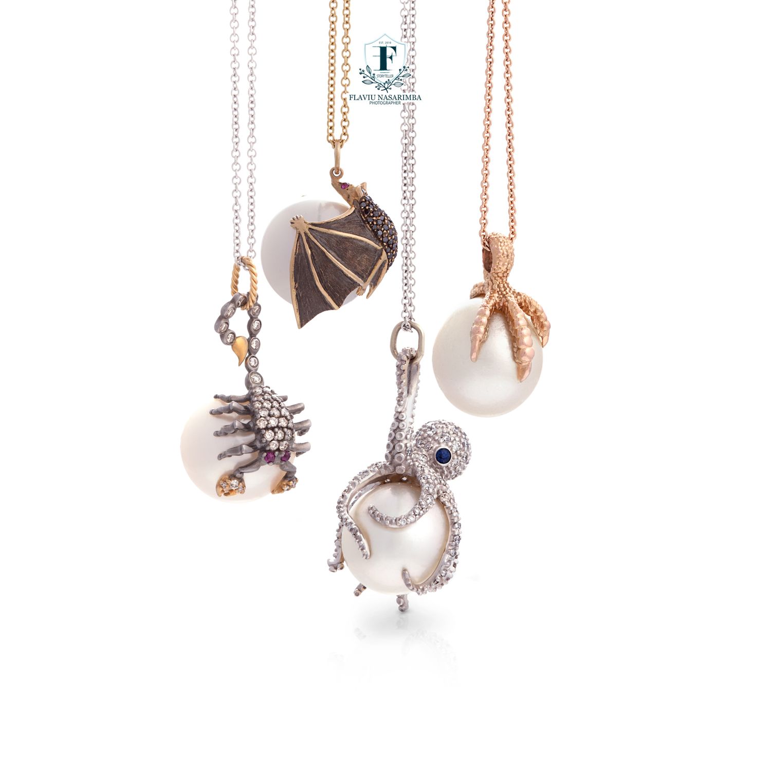 Four large pearl pendant necklaces featuring animal-themed rose gold and diamond charms including tiger and panther.