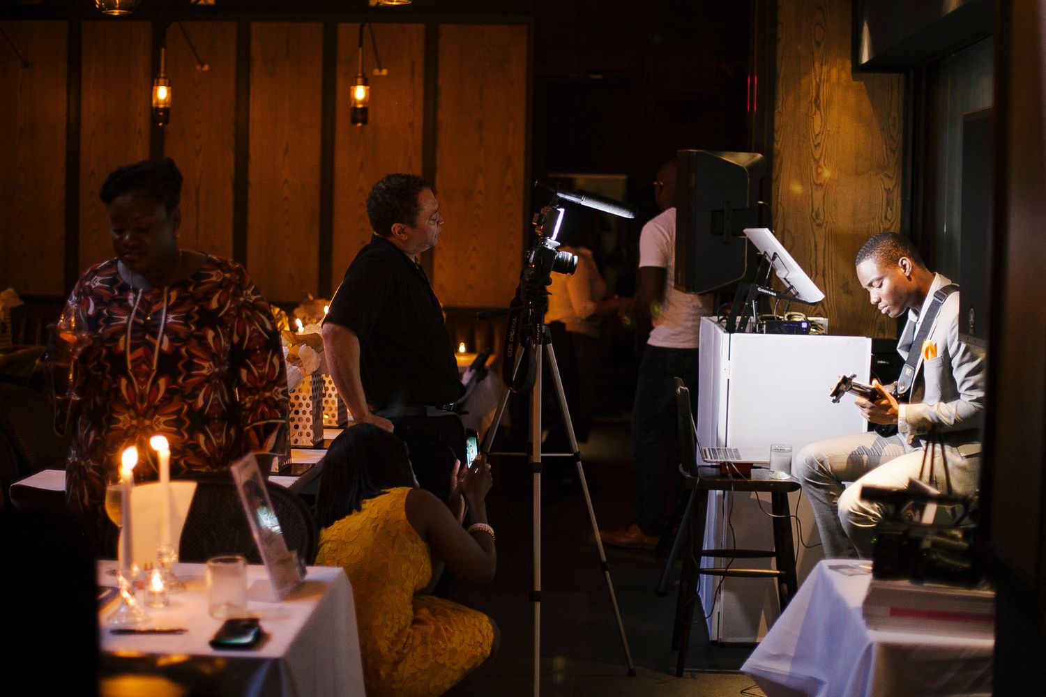 Behind-the-scenes filming setup with cameras and lighting at The Capable Bride wedding planning event.
