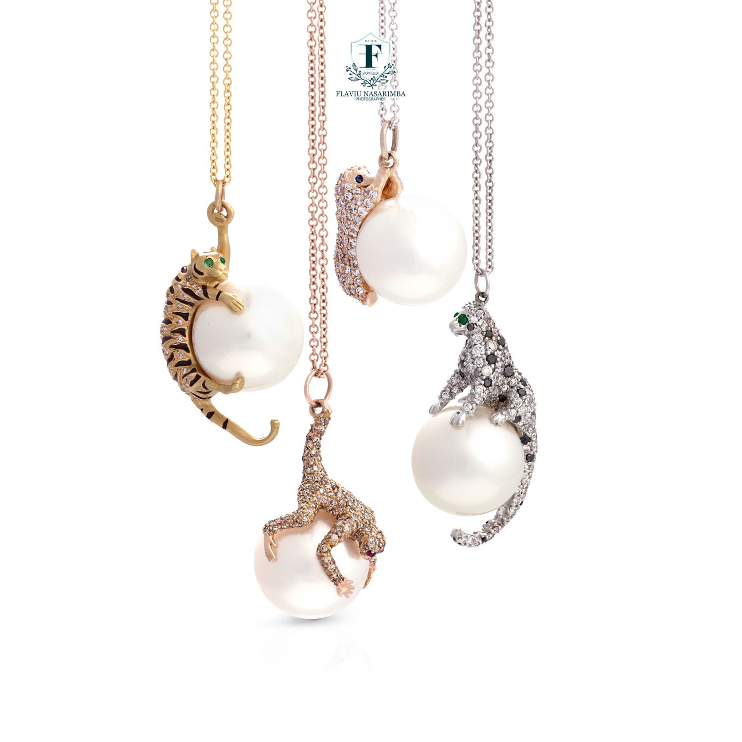 Rose gold drop earrings with snake motif, pavé diamond leaves, and rectangular green stone pendants.